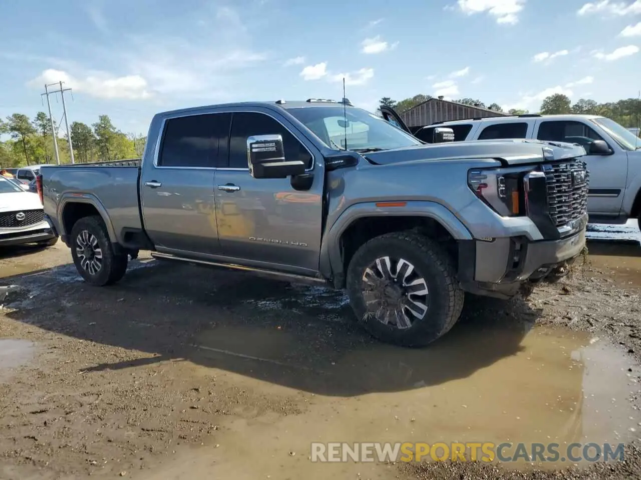 4 Photograph of a damaged car 1GT49YEYXRF144640 GMC SIERRA 2024