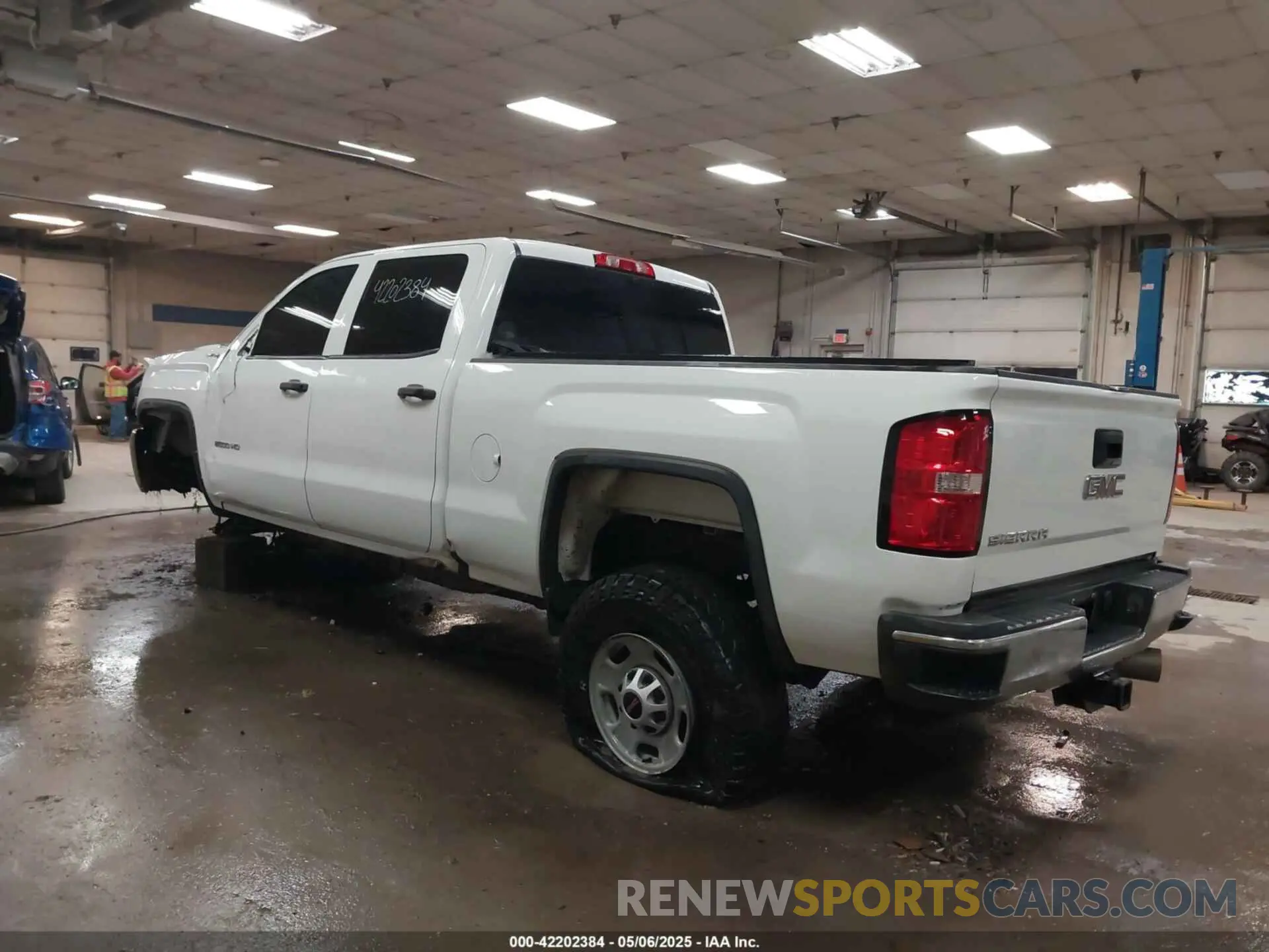 3 Photograph of a damaged car 1GT12NEY8KF234753 GMC SIERRA 2500HD 2019