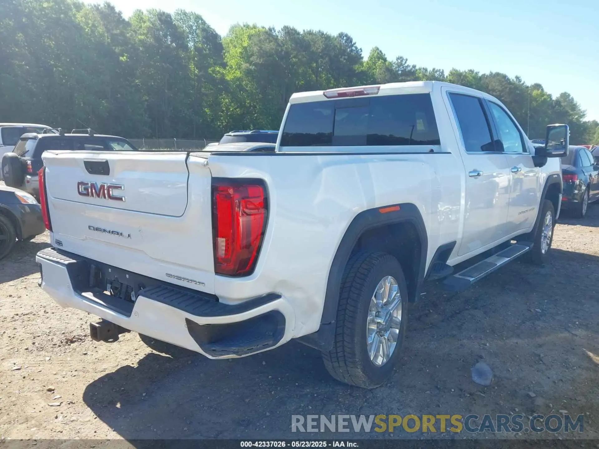 4 Photograph of a damaged car 1GT49REY6LF302999 GMC SIERRA 2500HD 2020