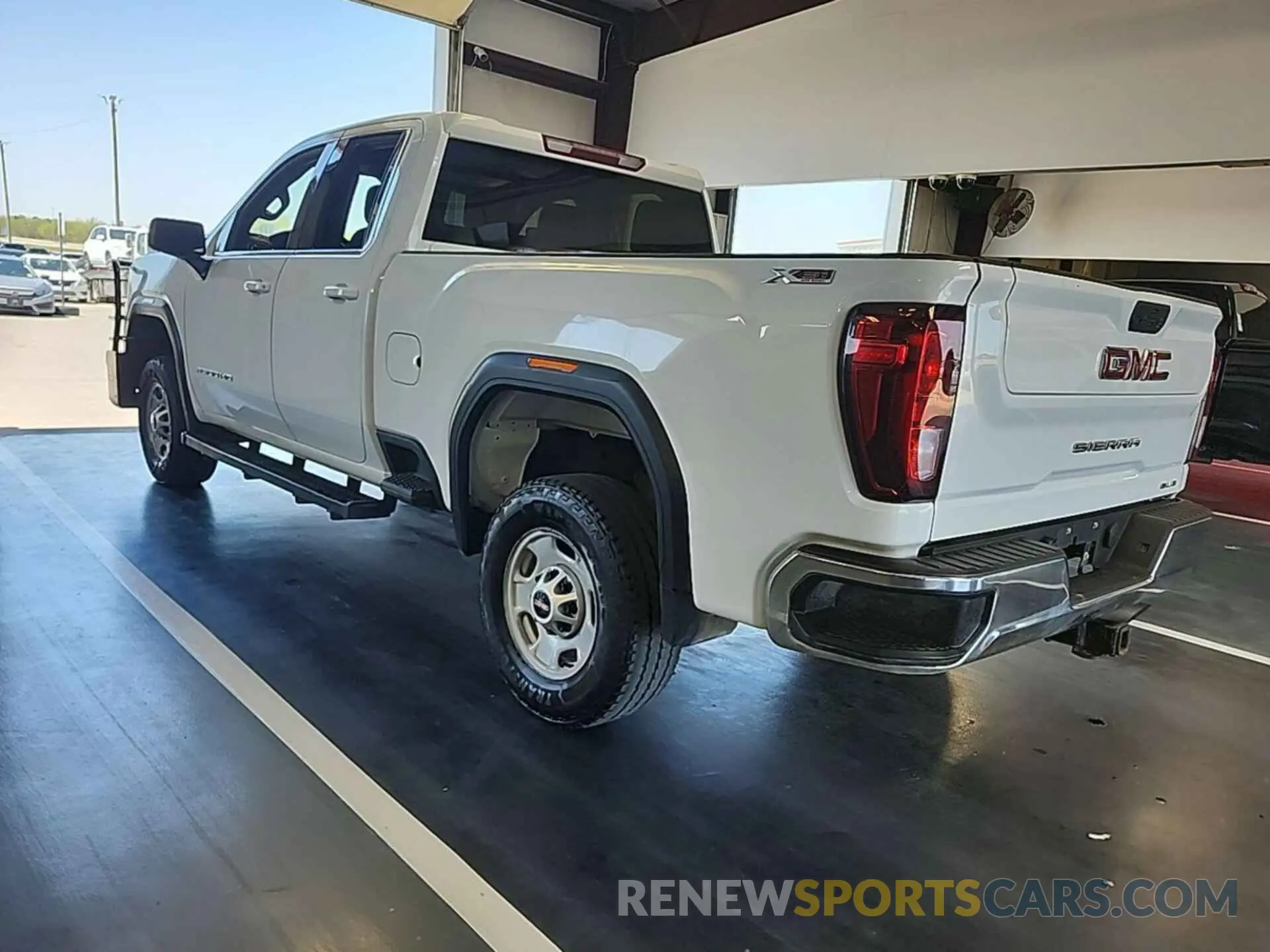 24 Photograph of a damaged car 1GT29ME71NF245793 GMC SIERRA 2500HD 2022