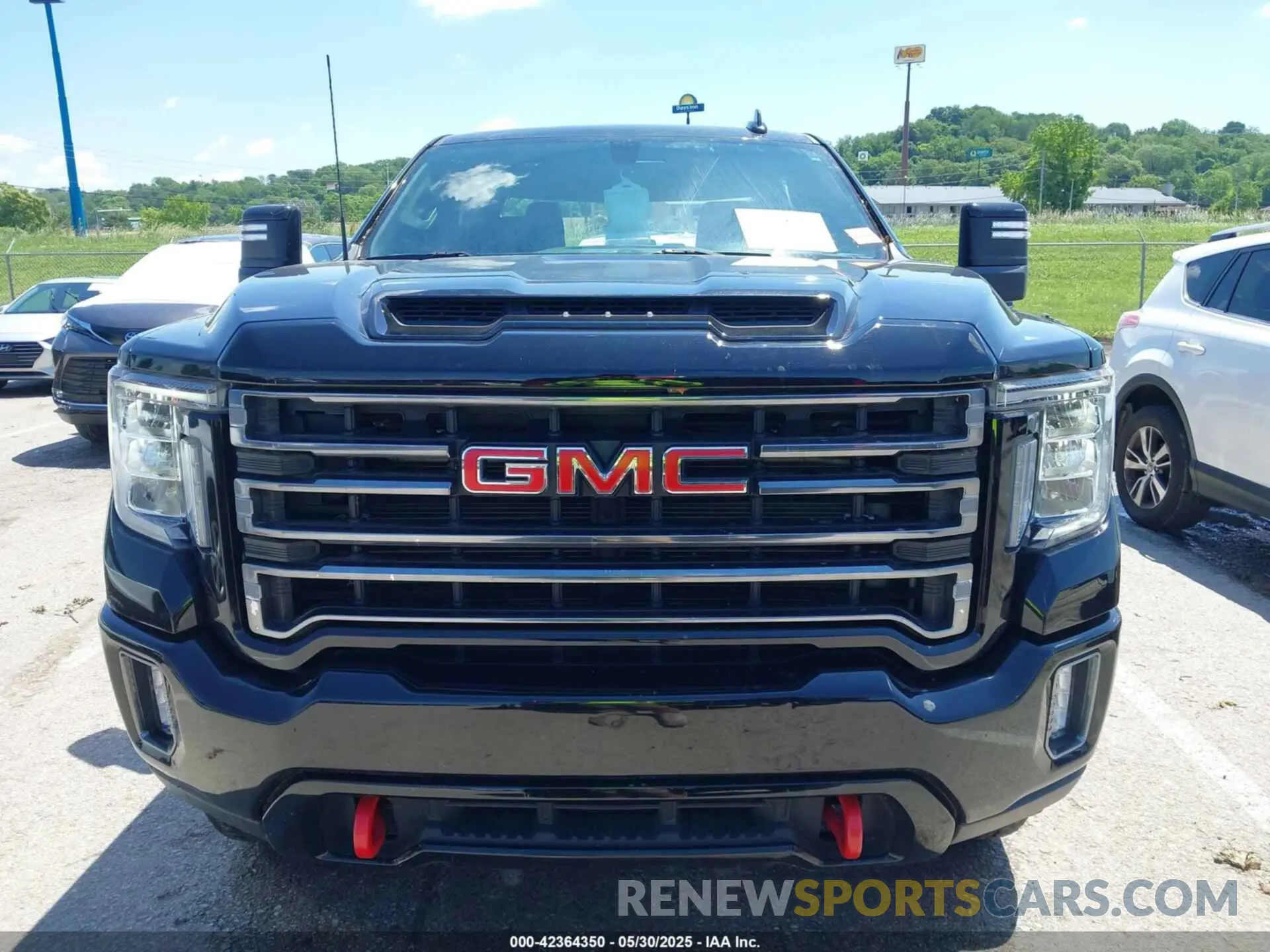 12 Photograph of a damaged car 1GT49PEY1NF114494 GMC SIERRA 2500HD 2022