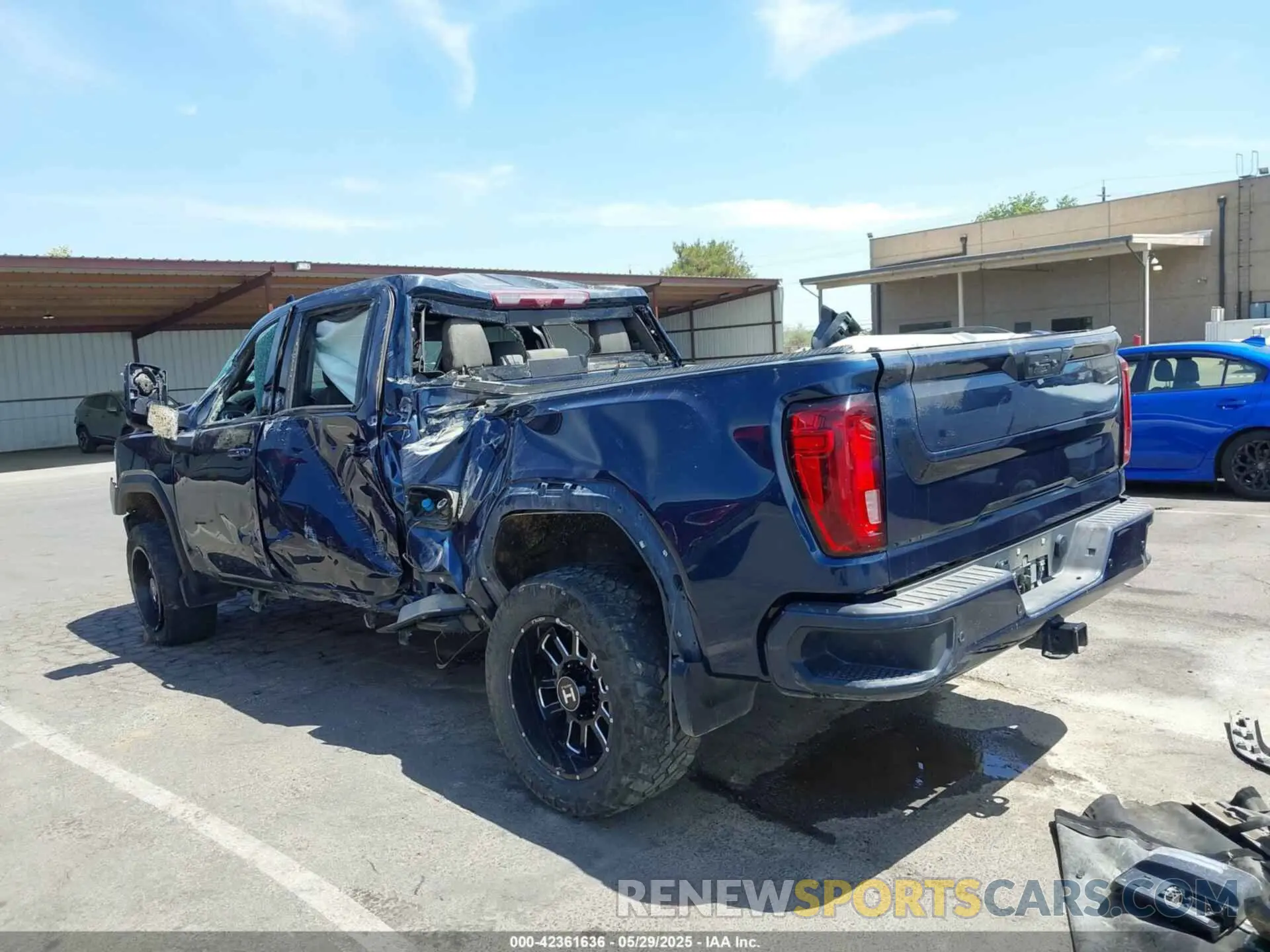 3 Photograph of a damaged car 1GT49PEY9NF148070 GMC SIERRA 2500HD 2022