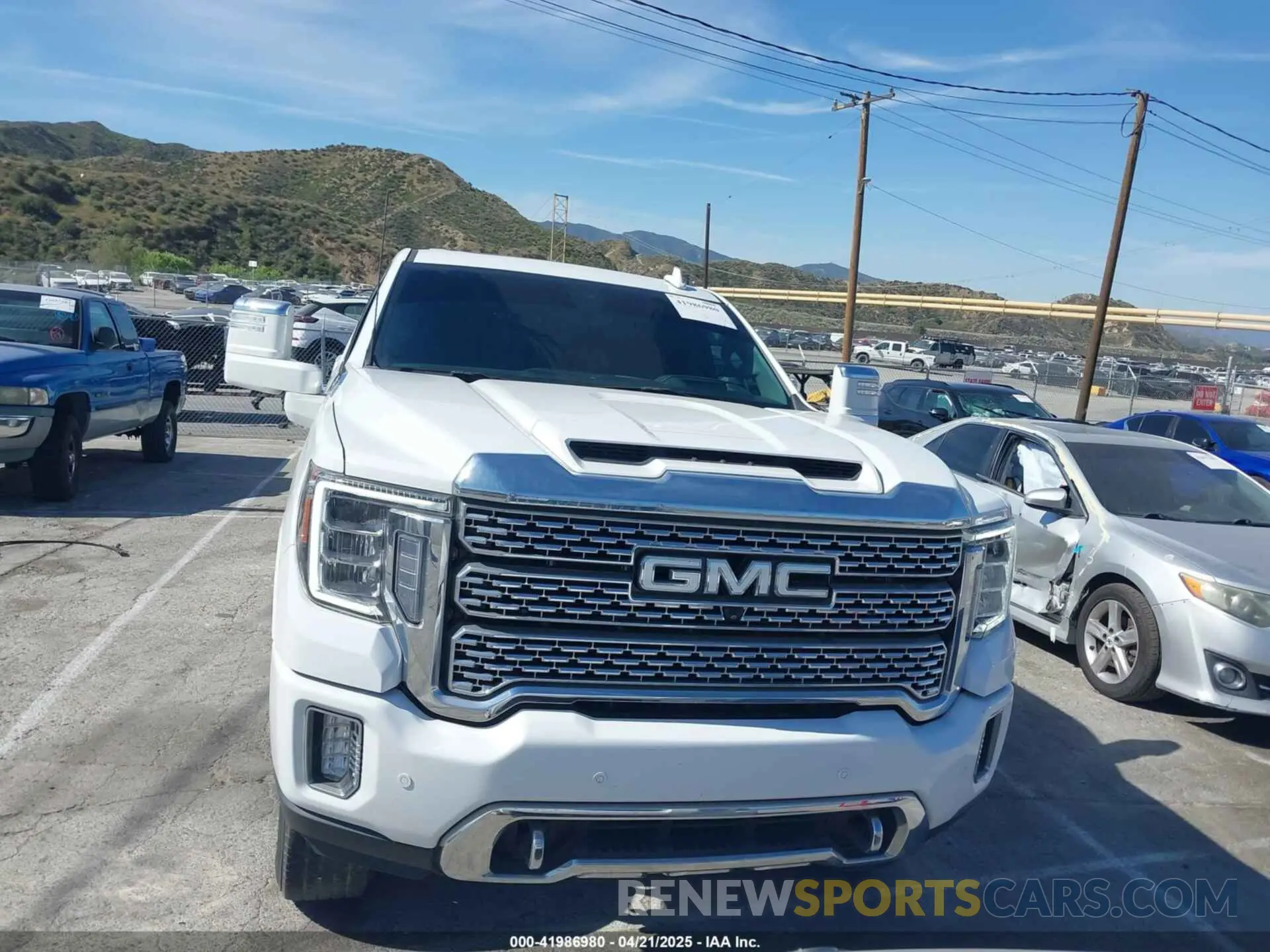 12 Photograph of a damaged car 1GT49REY0NF186119 GMC SIERRA 2500HD 2022