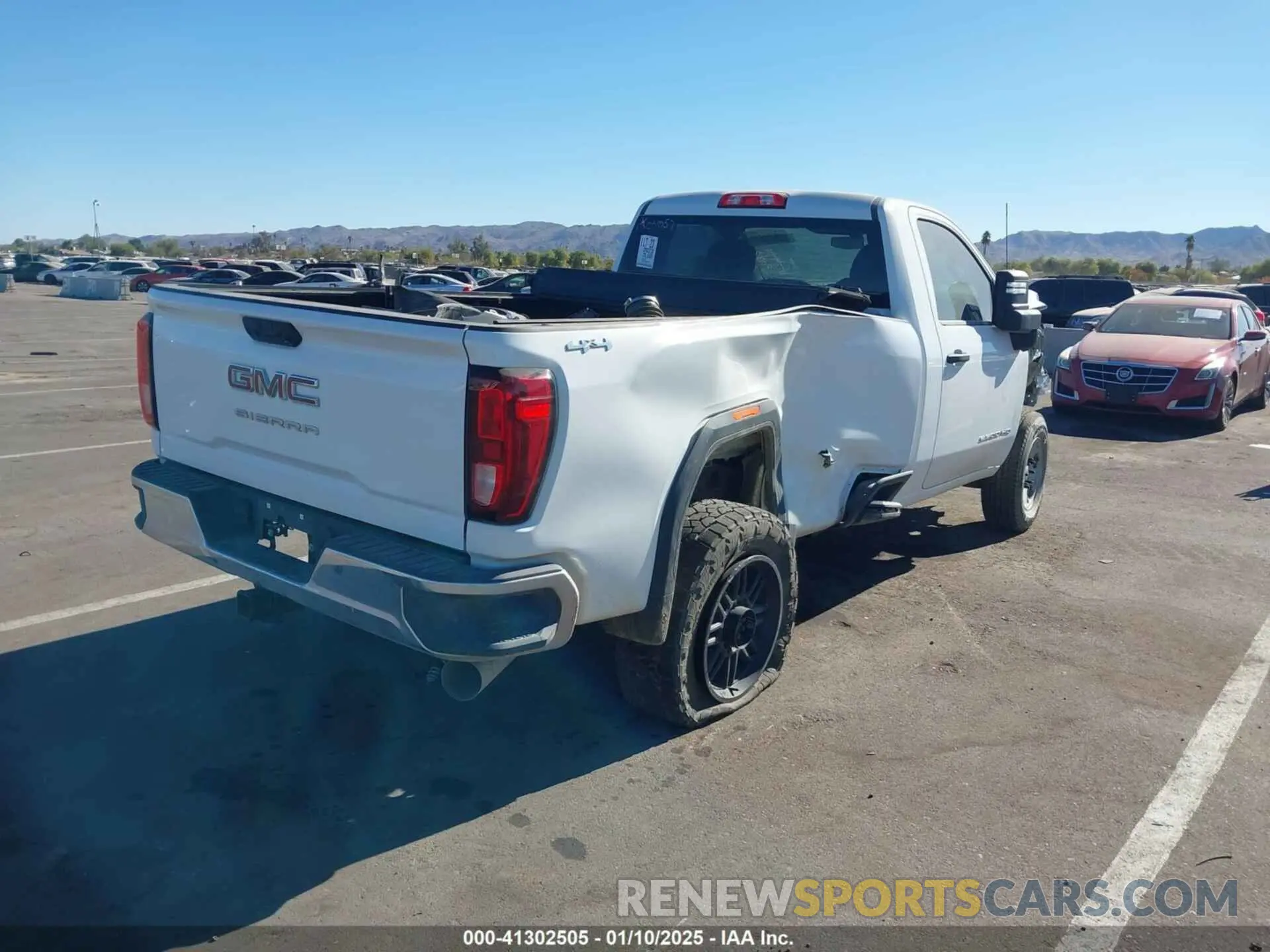 4 Photograph of a damaged car 1GT39LEY8PF159942 GMC SIERRA 2500HD 2023