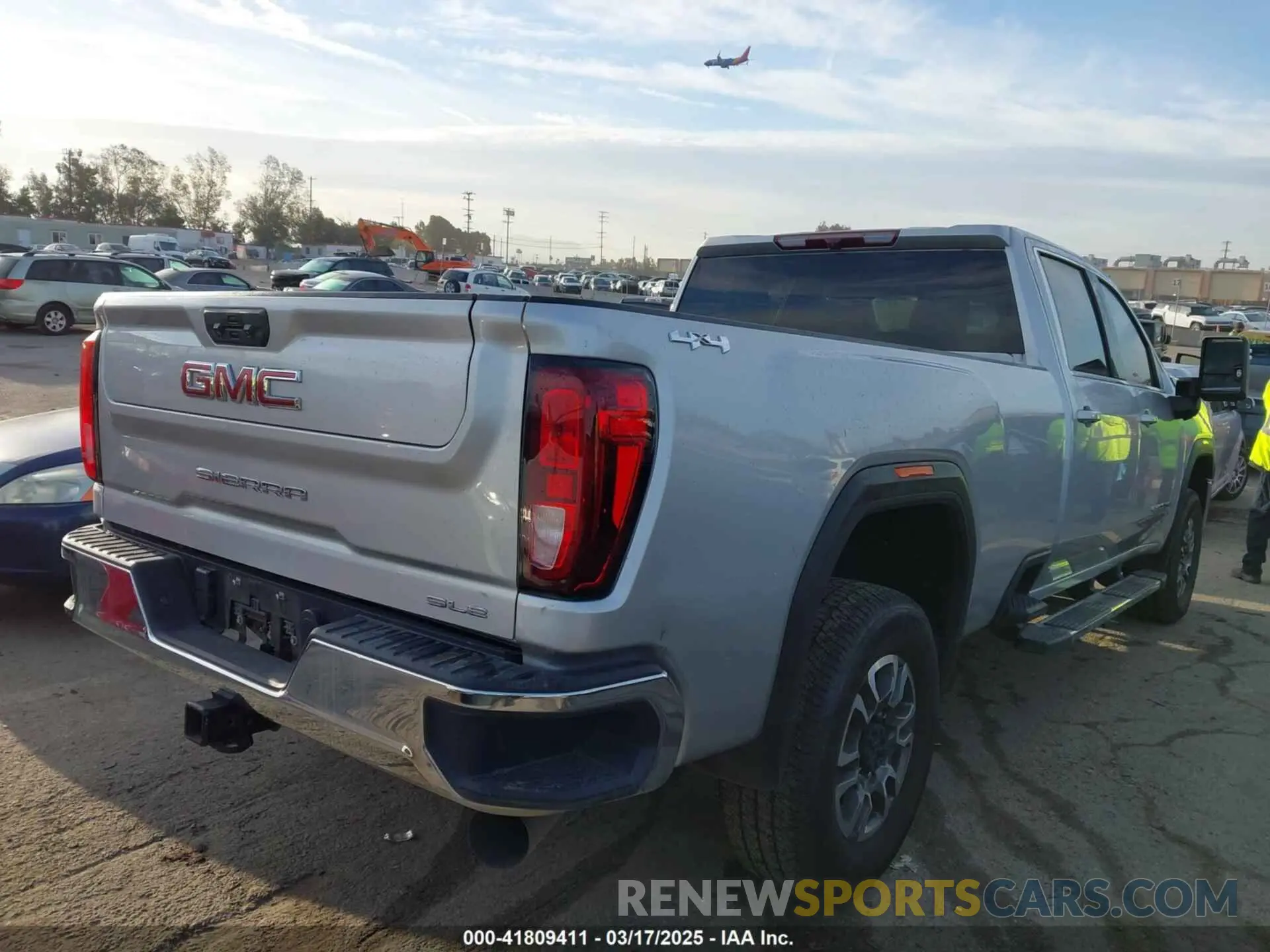 4 Photograph of a damaged car 1GT49MEY1PF194560 GMC SIERRA 2500HD 2023
