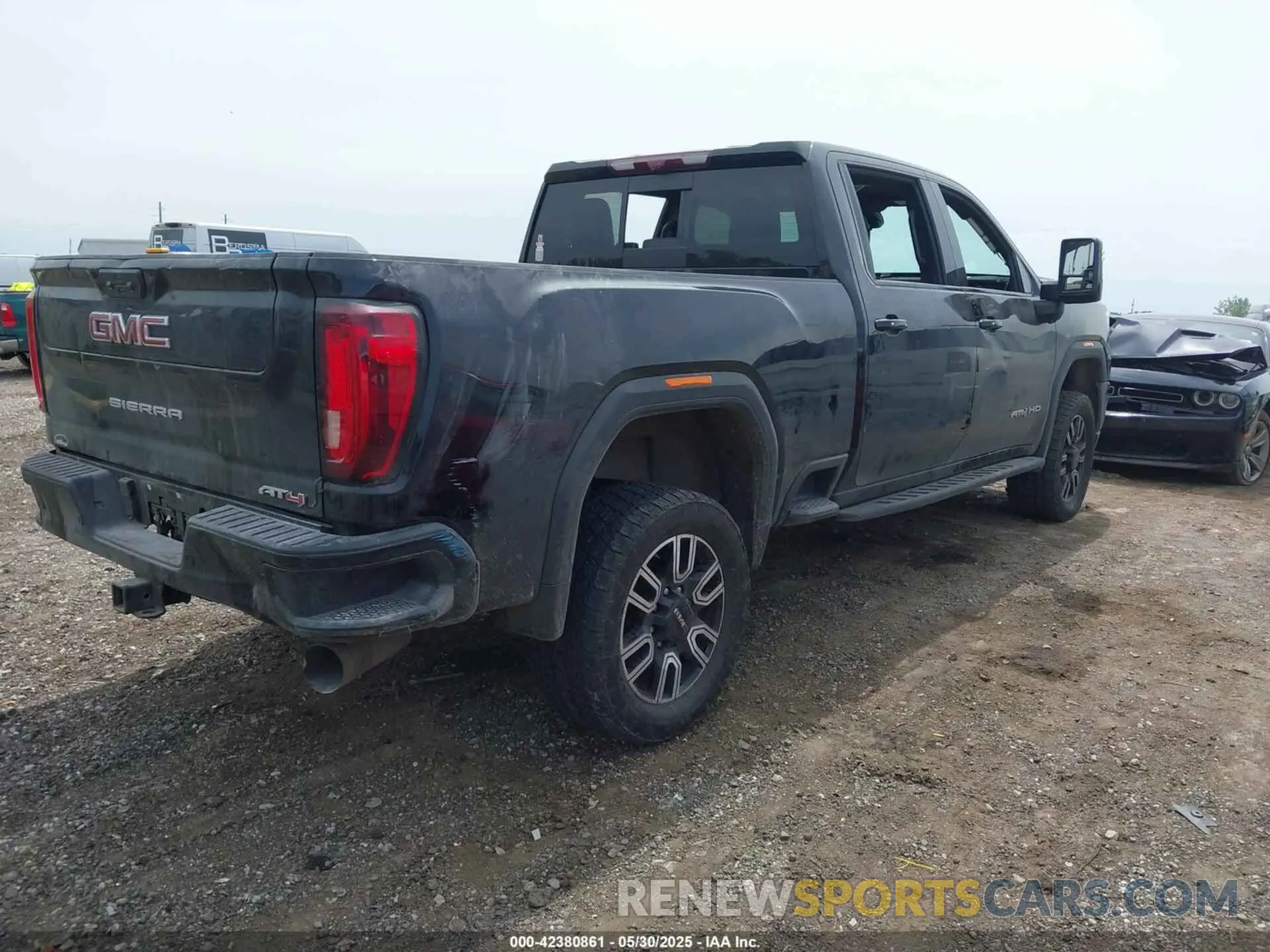 4 Photograph of a damaged car 1GT49PEY0PF223418 GMC SIERRA 2500HD 2023