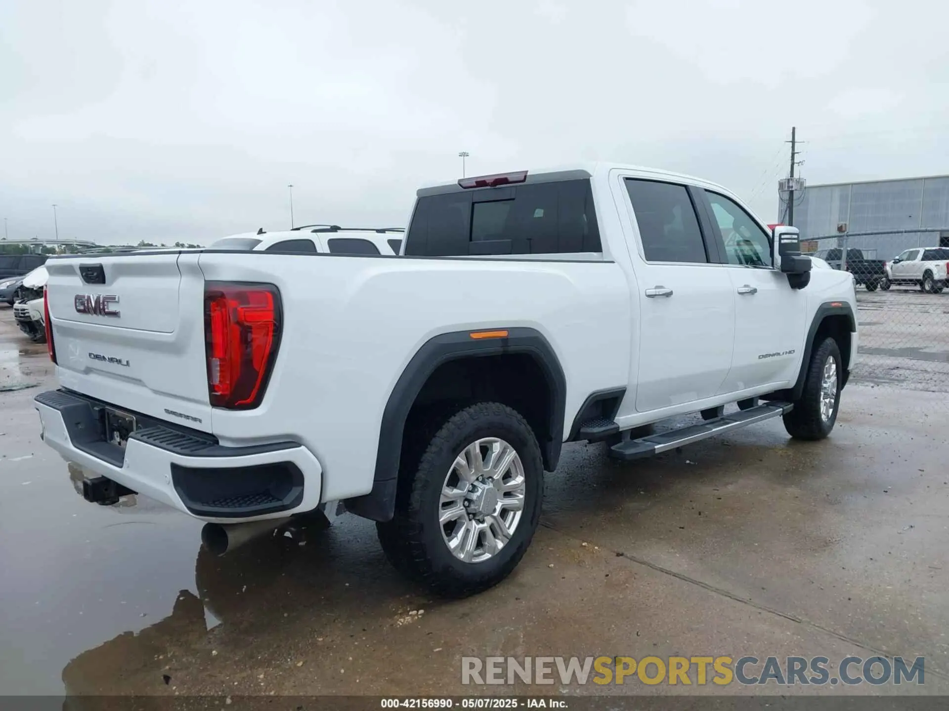4 Photograph of a damaged car 1GT49REY2PF230379 GMC SIERRA 2500HD 2023