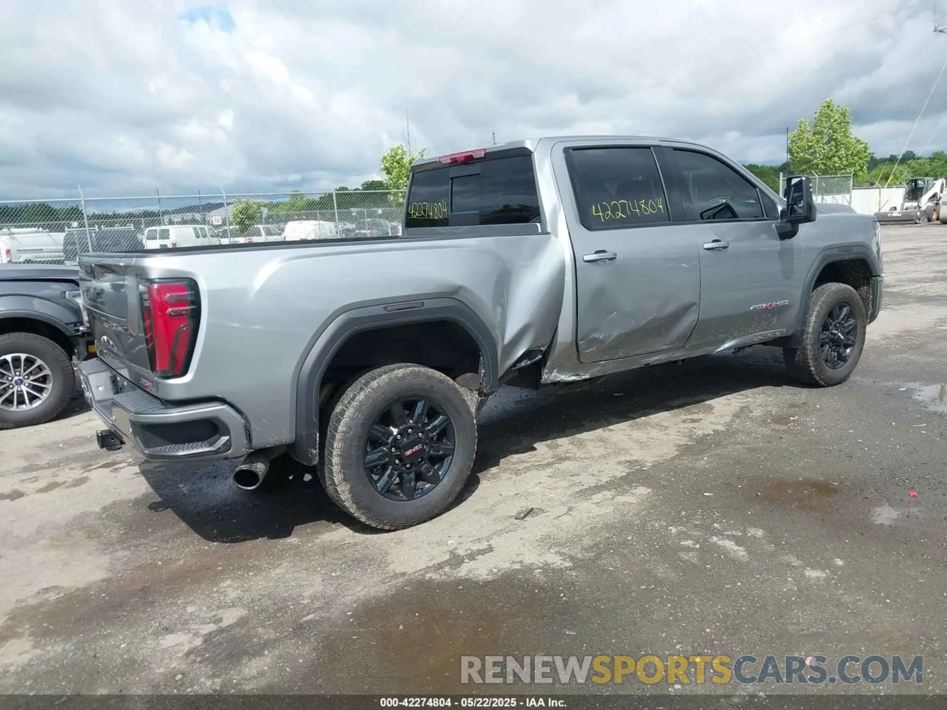 4 Photograph of a damaged car 1GT49PE79RF403426 GMC SIERRA 2500HD 2024