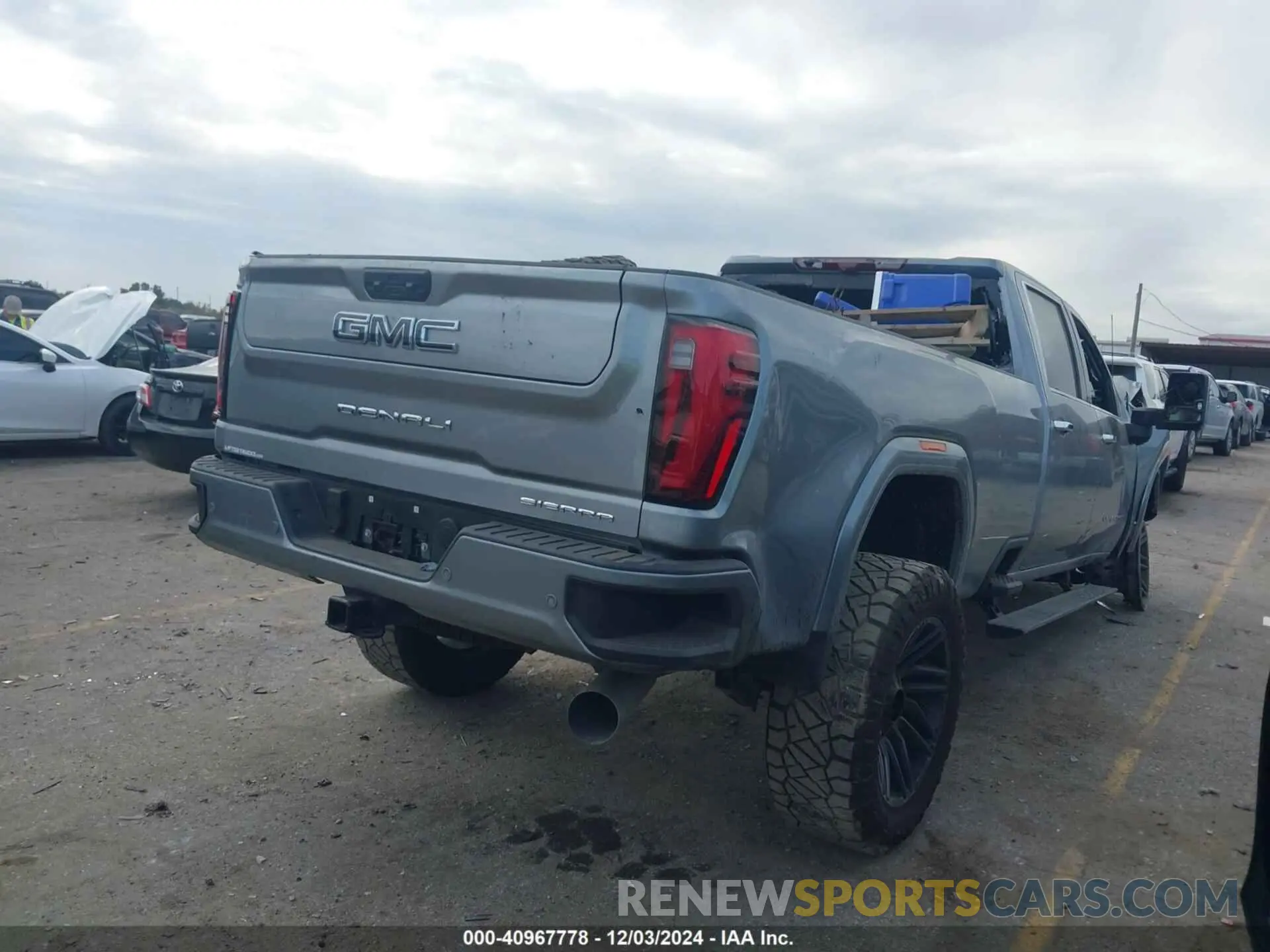 4 Photograph of a damaged car 1GT49XEY1RF186236 GMC SIERRA 2500HD 2024