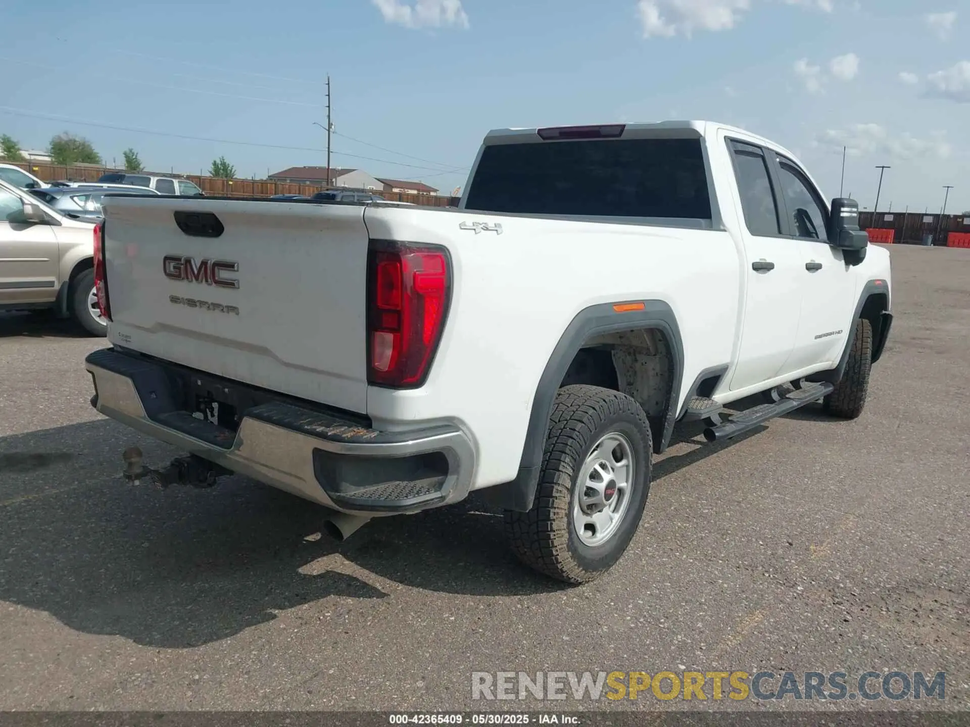 4 Photograph of a damaged car 1GT59LE72RF136949 GMC SIERRA 2500HD 2024