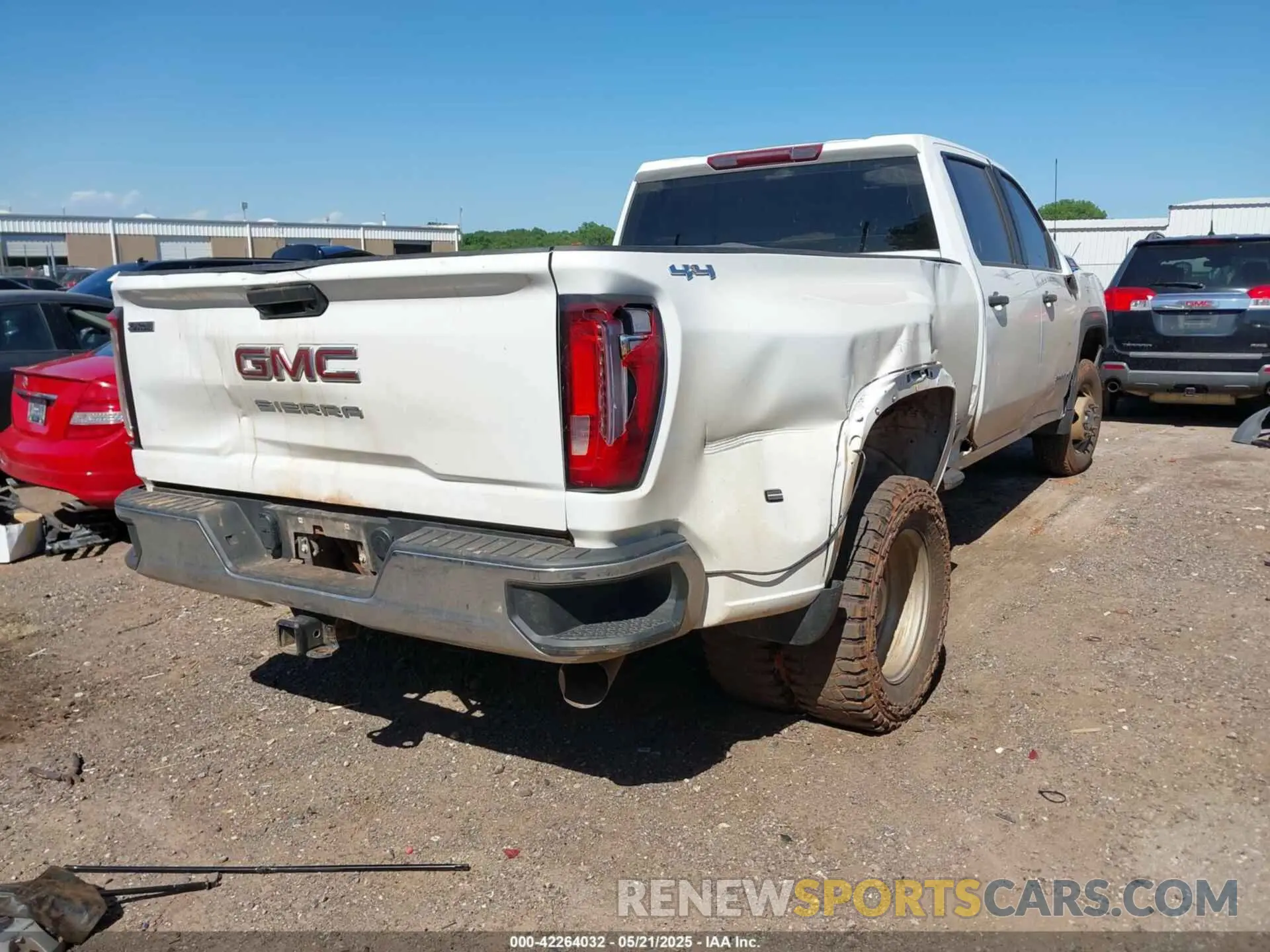 4 Photograph of a damaged car 1GT49SEY8PF220169 GMC SIERRA 3500HD 2023
