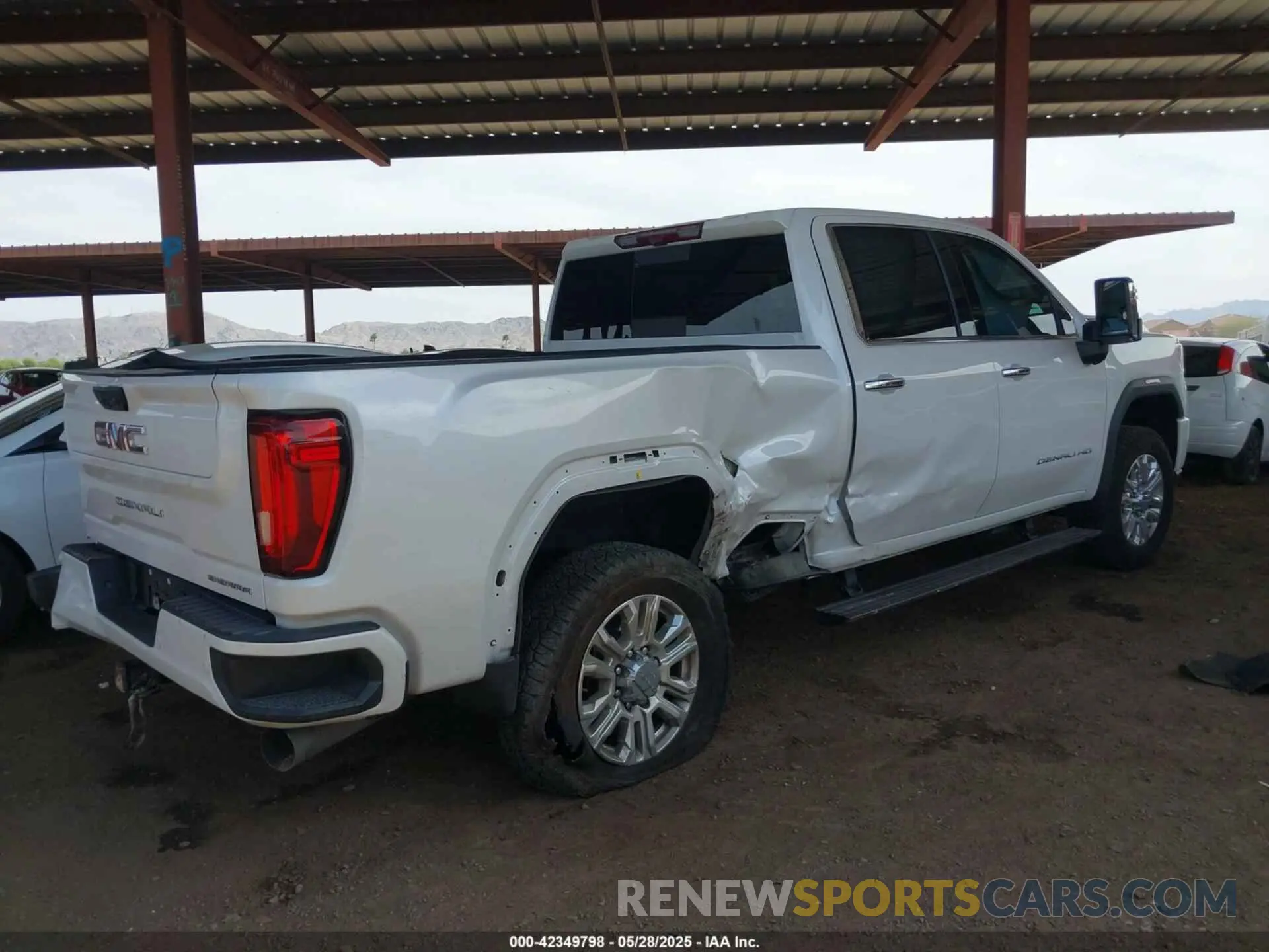 4 Photograph of a damaged car 1GT49WEY9PF230345 GMC SIERRA 3500HD 2023
