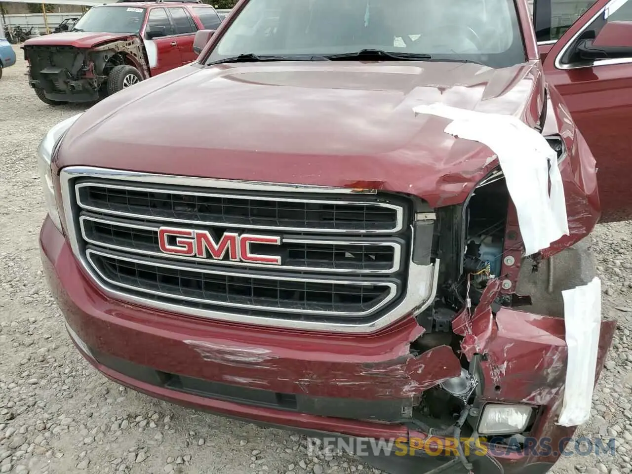13 Photograph of a damaged car 1GKS1DKC2KR354691 GMC YUKON 2019