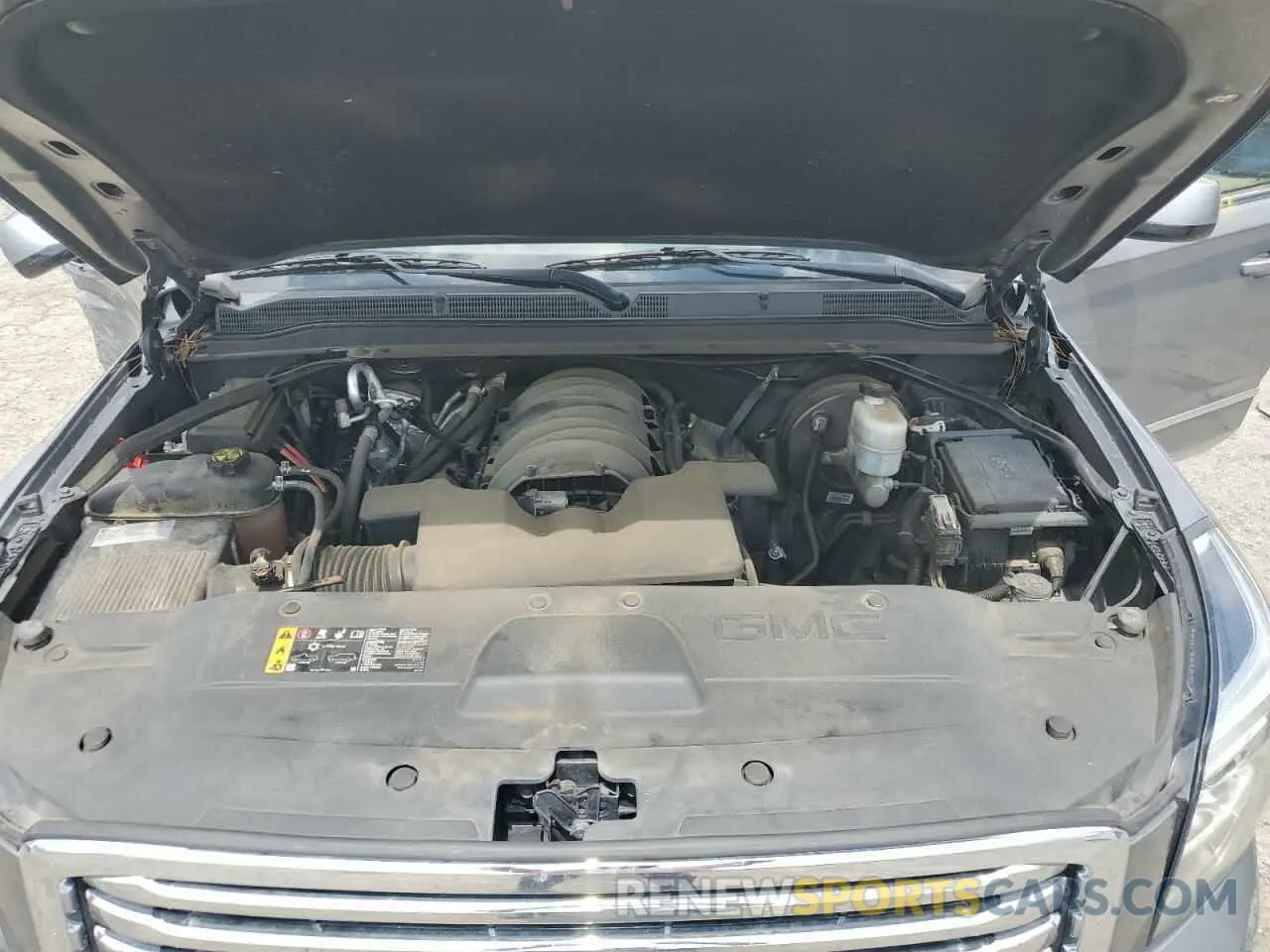 12 Photograph of a damaged car 1GKS1GKC0KR325305 GMC YUKON 2019
