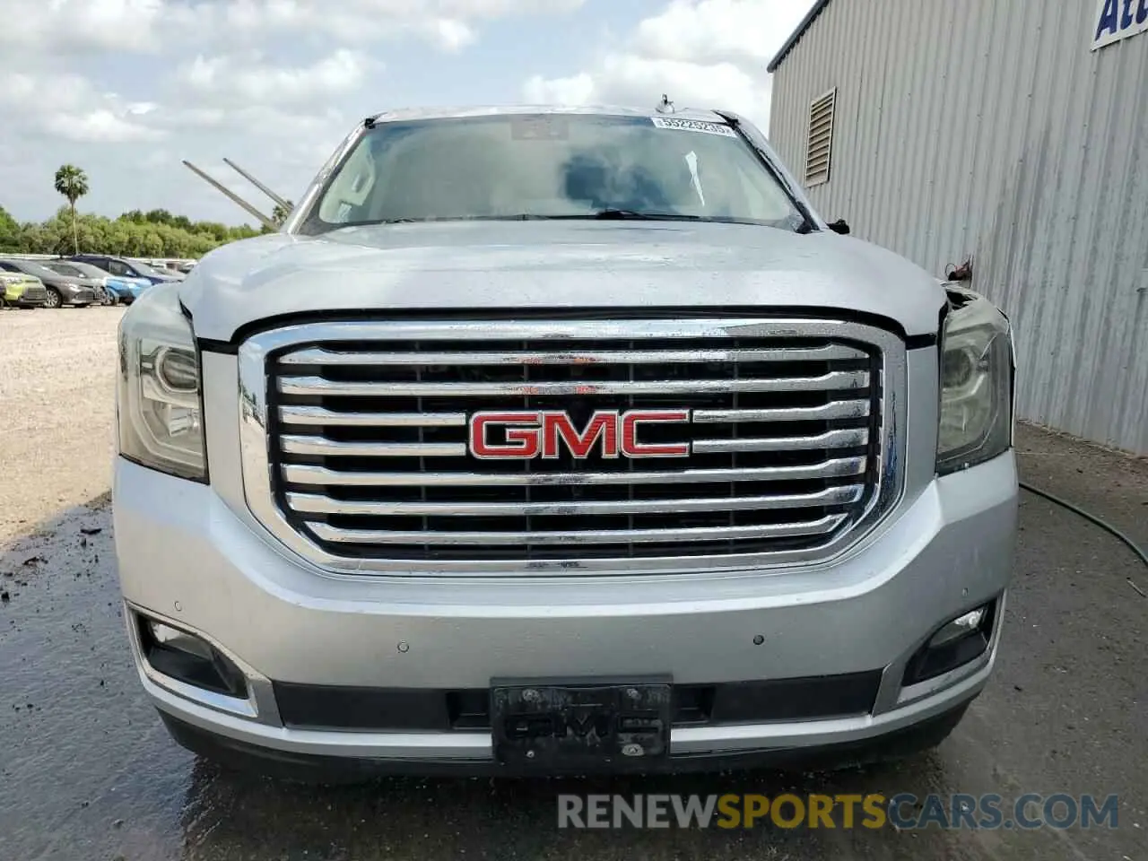 5 Photograph of a damaged car 1GKS1GKC5KR409622 GMC YUKON 2019