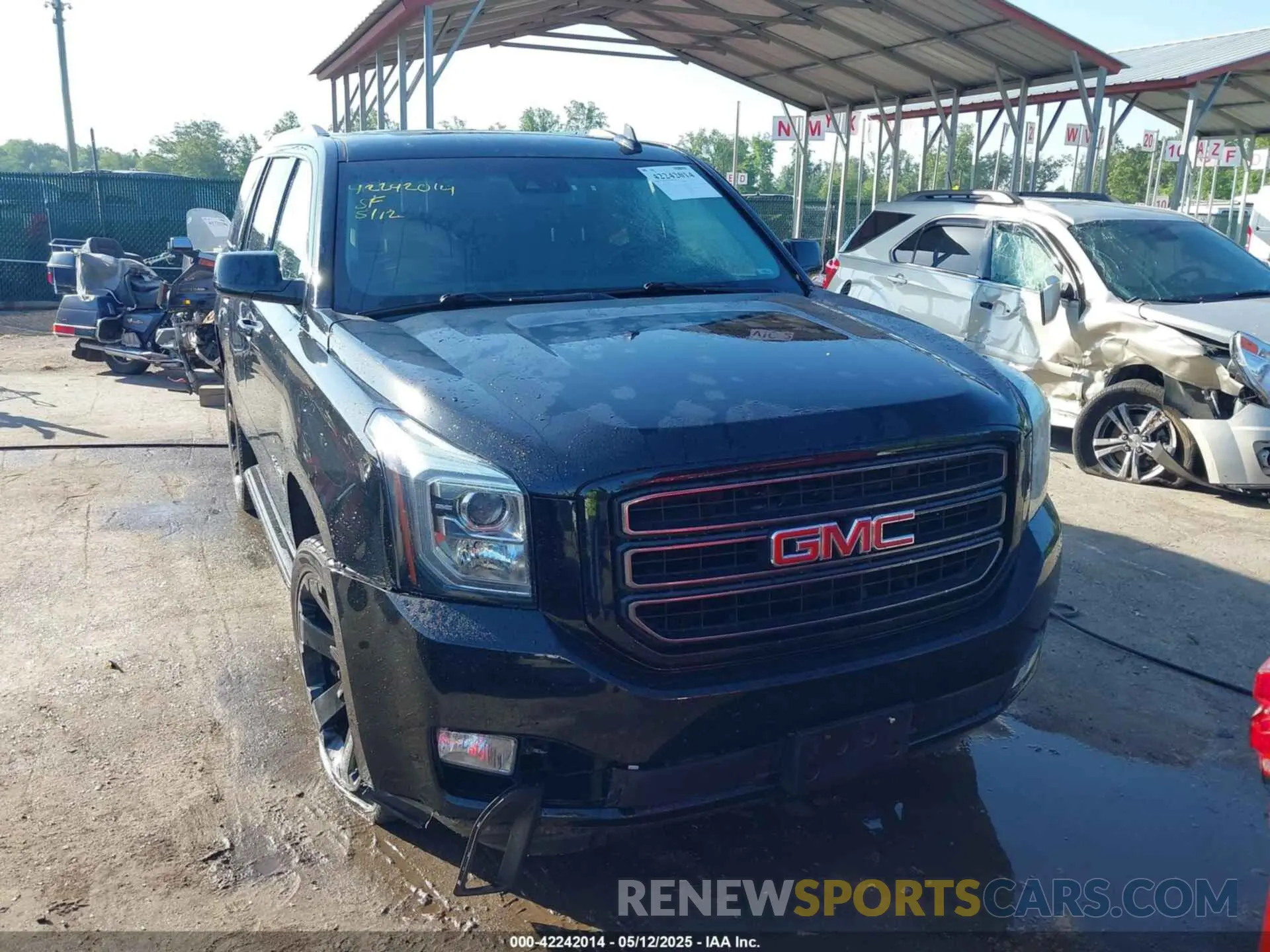 13 Photograph of a damaged car 1GKS2BKJ1KR208508 GMC YUKON 2019