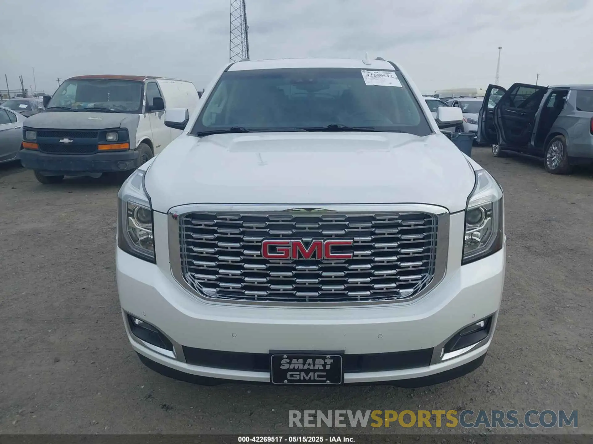 13 Photograph of a damaged car 1GKS2CKJ8KR355981 GMC YUKON 2019