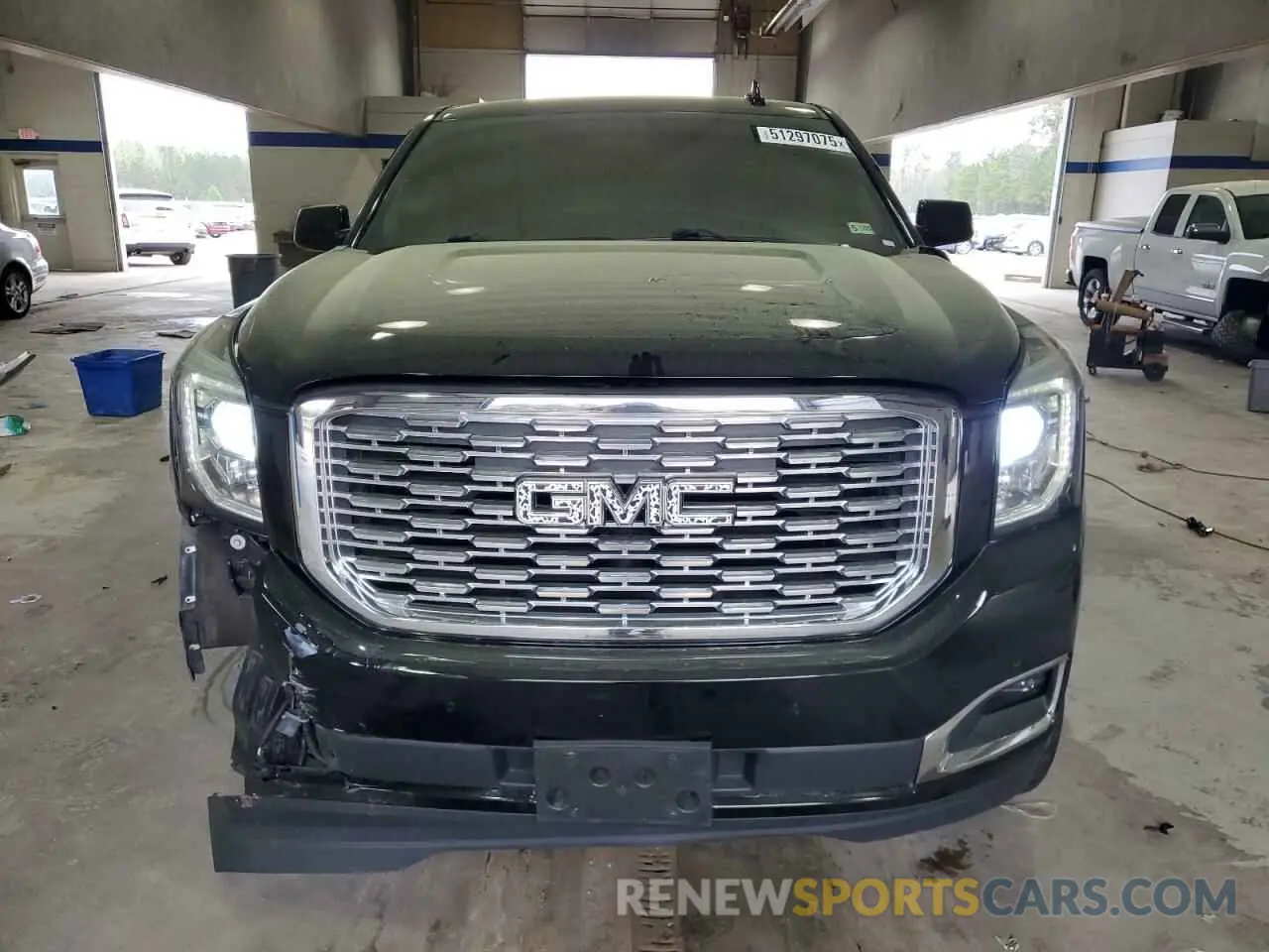 5 Photograph of a damaged car 1GKS2CKJ9KR409479 GMC YUKON 2019