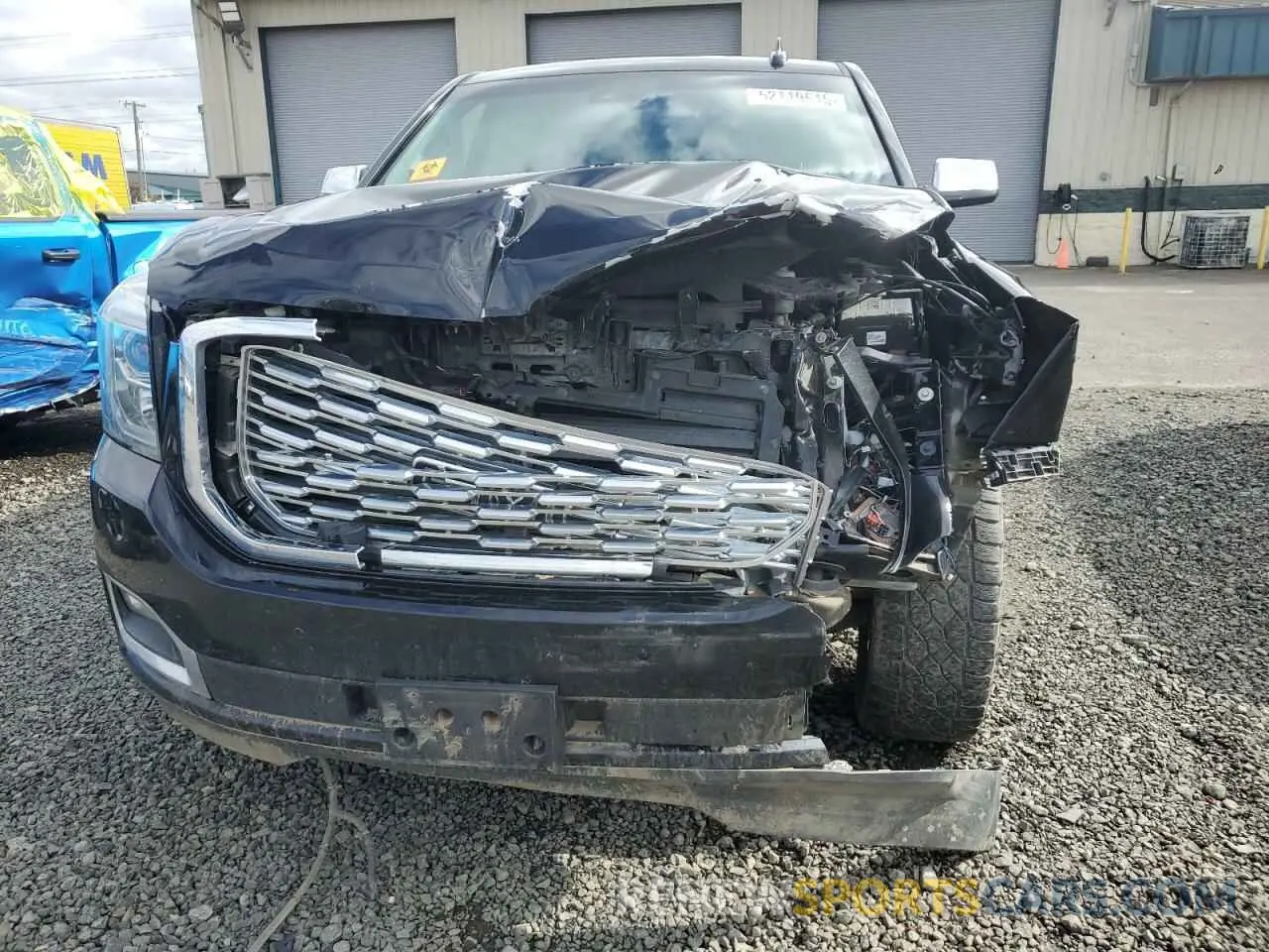 12 Photograph of a damaged car 1GKS2CKJXKR381028 GMC YUKON 2019