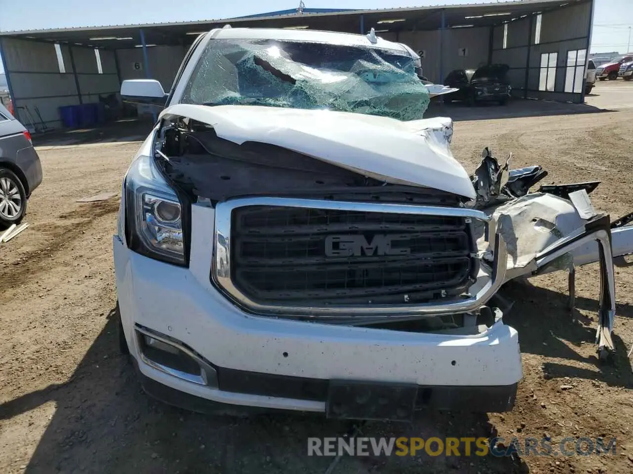 5 Photograph of a damaged car 1GKS2GKC0KR309103 GMC YUKON 2019