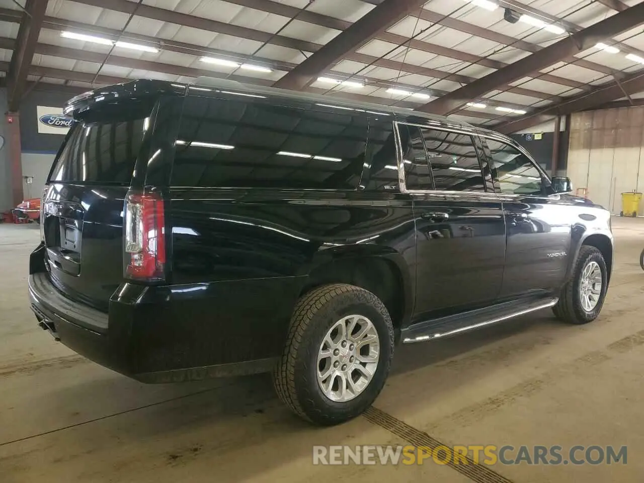 3 Photograph of a damaged car 1GKS2GKC1KR163990 GMC YUKON 2019