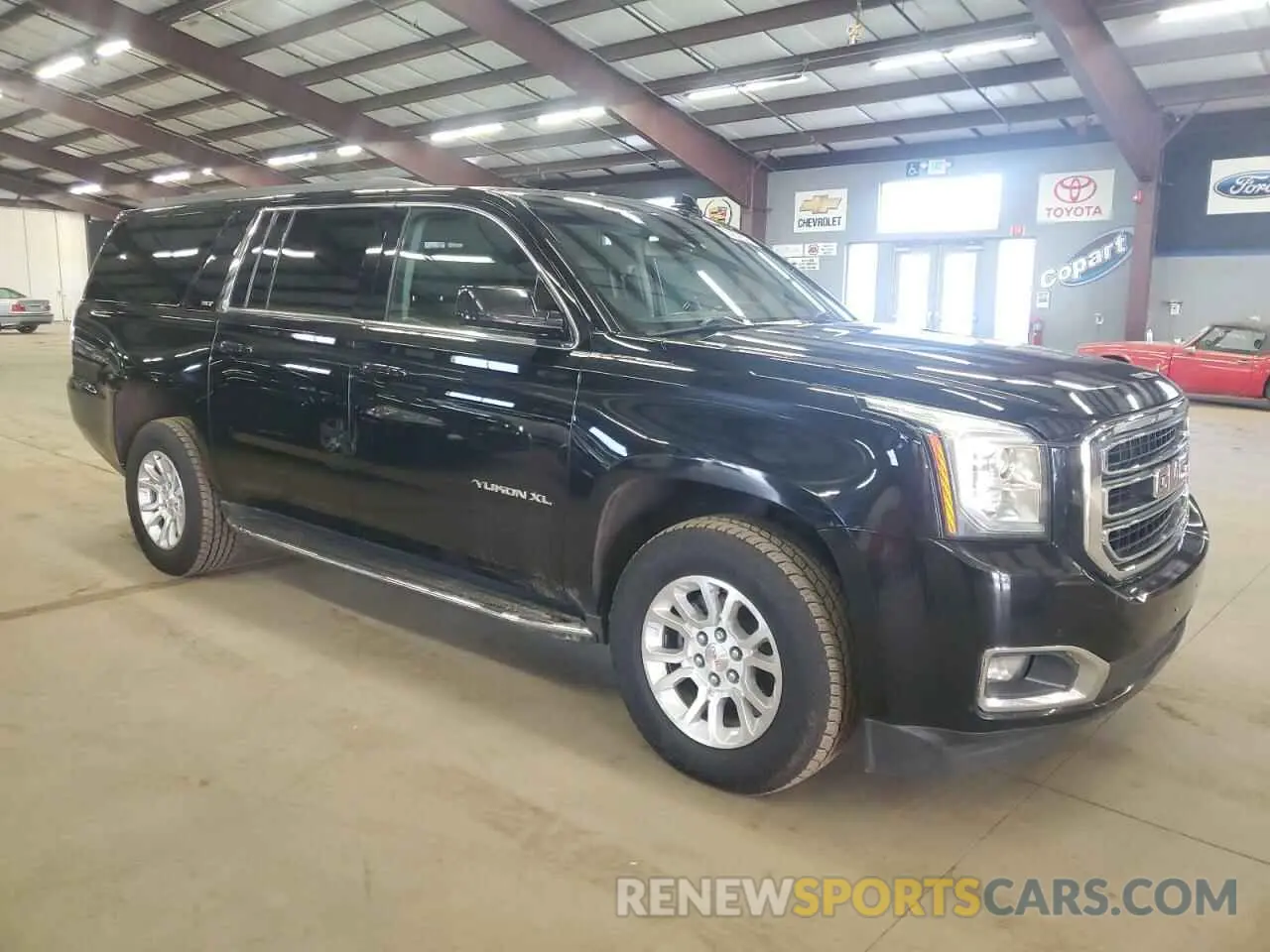 4 Photograph of a damaged car 1GKS2GKC1KR163990 GMC YUKON 2019