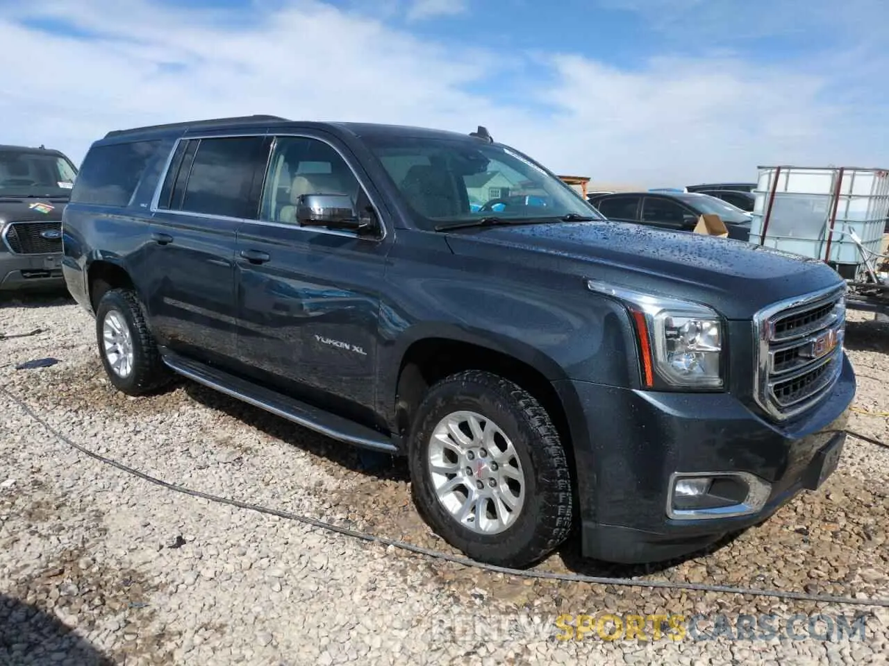 4 Photograph of a damaged car 1GKS2GKC4KR302722 GMC YUKON 2019