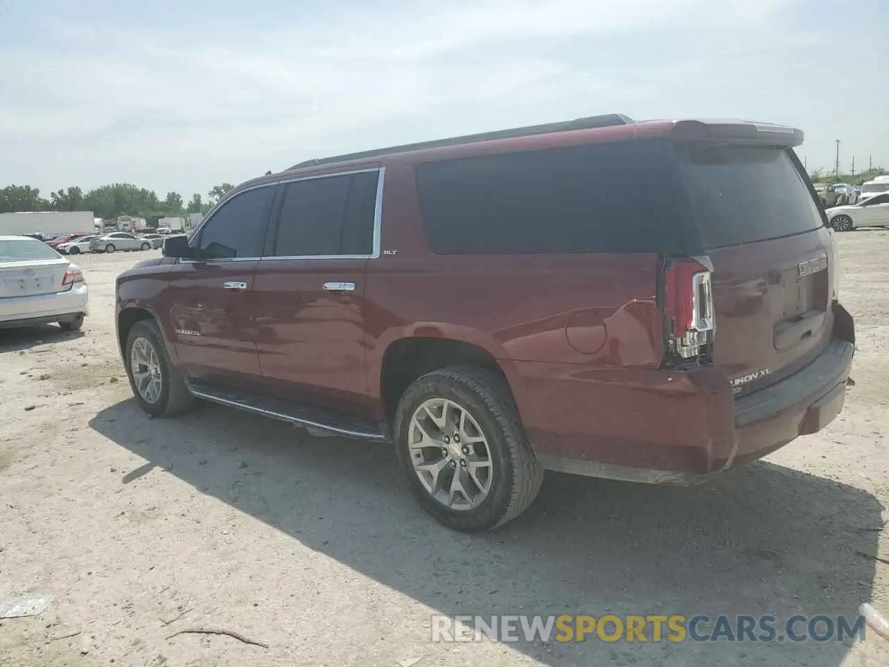 2 Photograph of a damaged car 1GKS2GKC5KR303605 GMC YUKON 2019