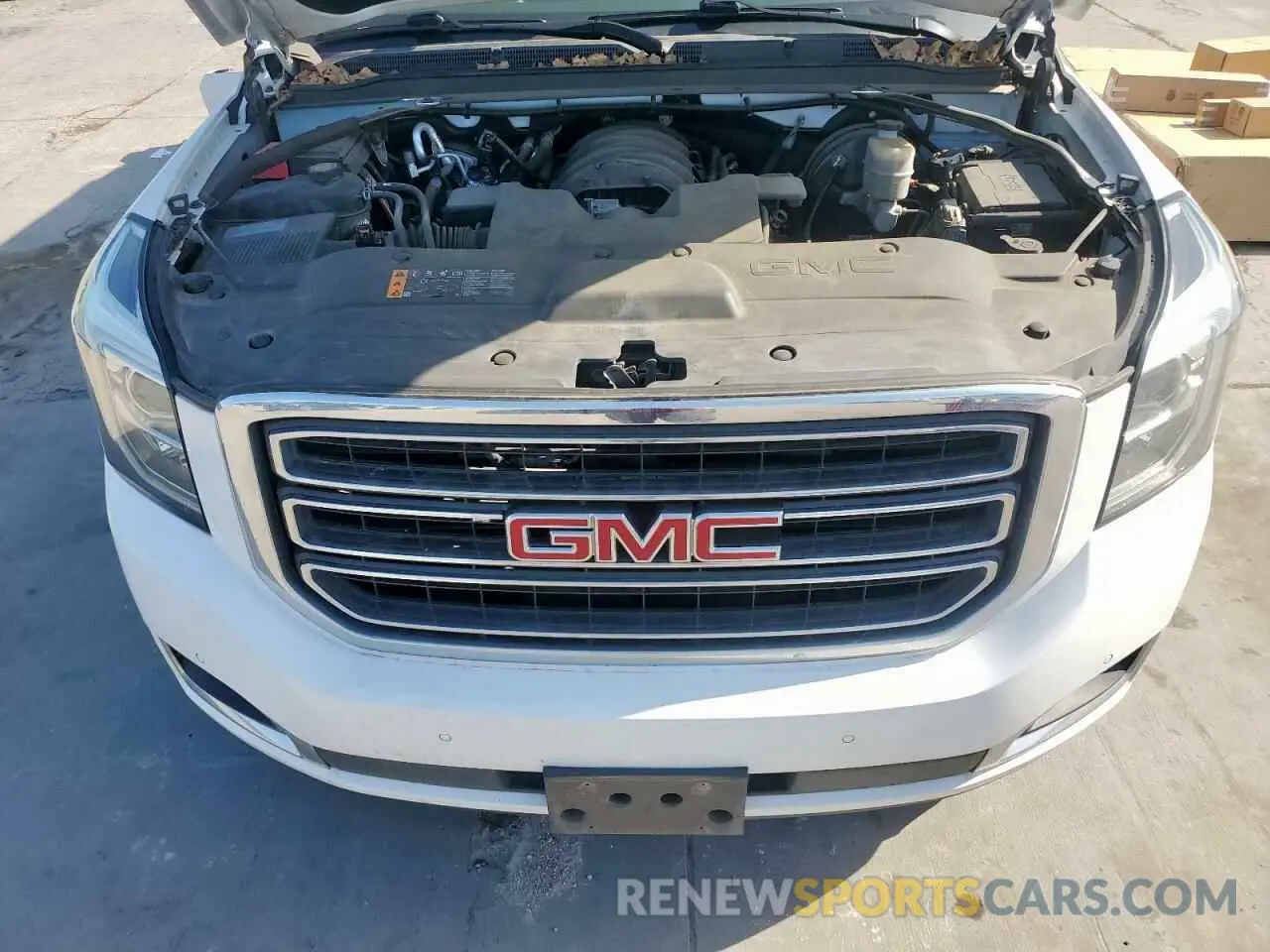 12 Photograph of a damaged car 1GKS2GKC5KR363643 GMC YUKON 2019