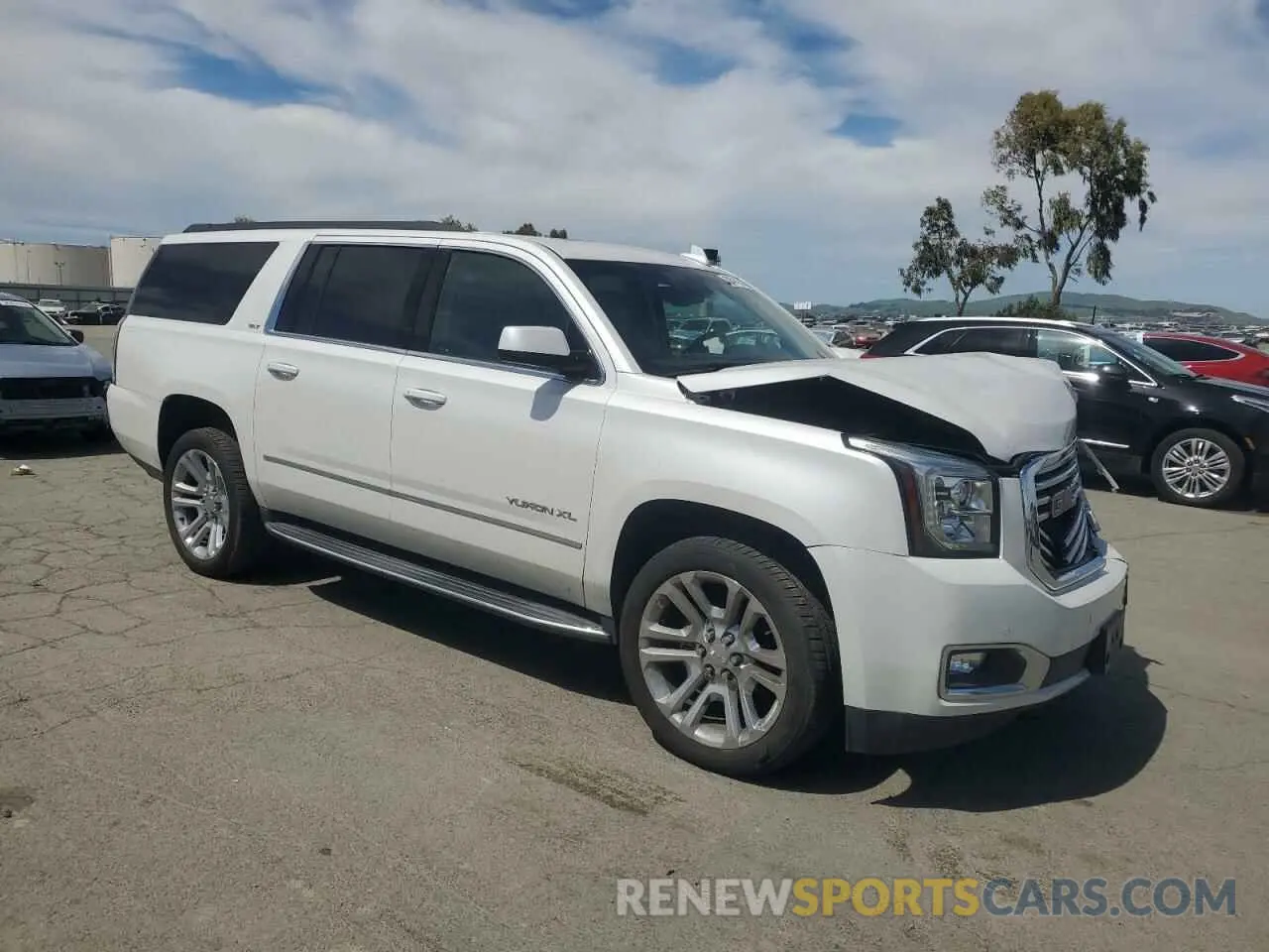 4 Photograph of a damaged car 1GKS2GKC5KR383231 GMC YUKON 2019