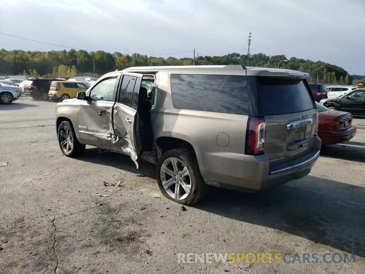 2 Photograph of a damaged car 1GKS2HKJ3KR247409 GMC YUKON 2019