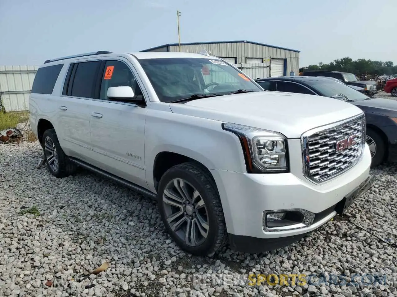 4 Photograph of a damaged car 1GKS2HKJ3KR386729 GMC YUKON 2019