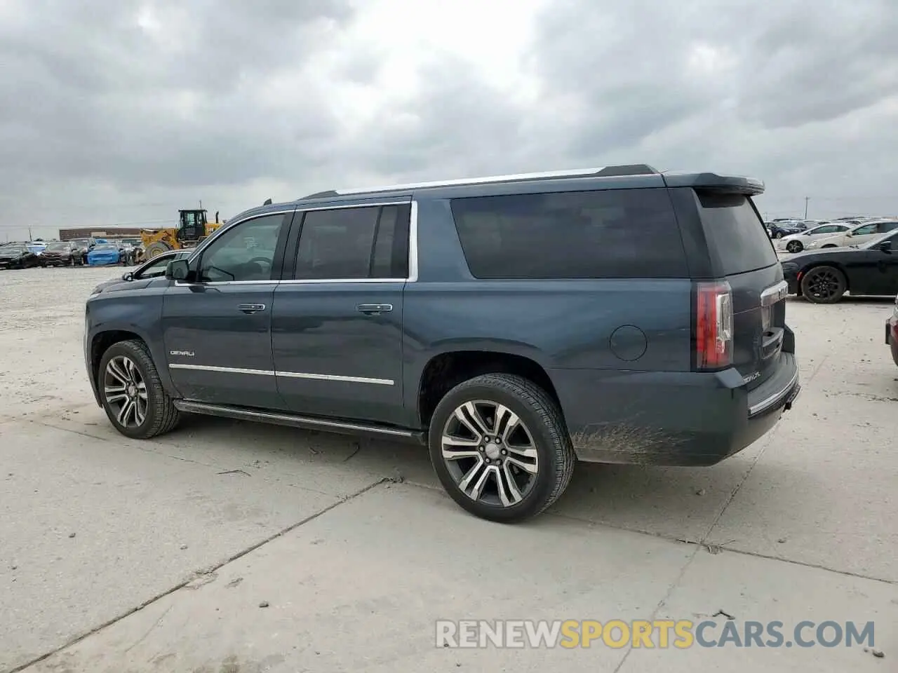 2 Photograph of a damaged car 1GKS2HKJ6KR304587 GMC YUKON 2019