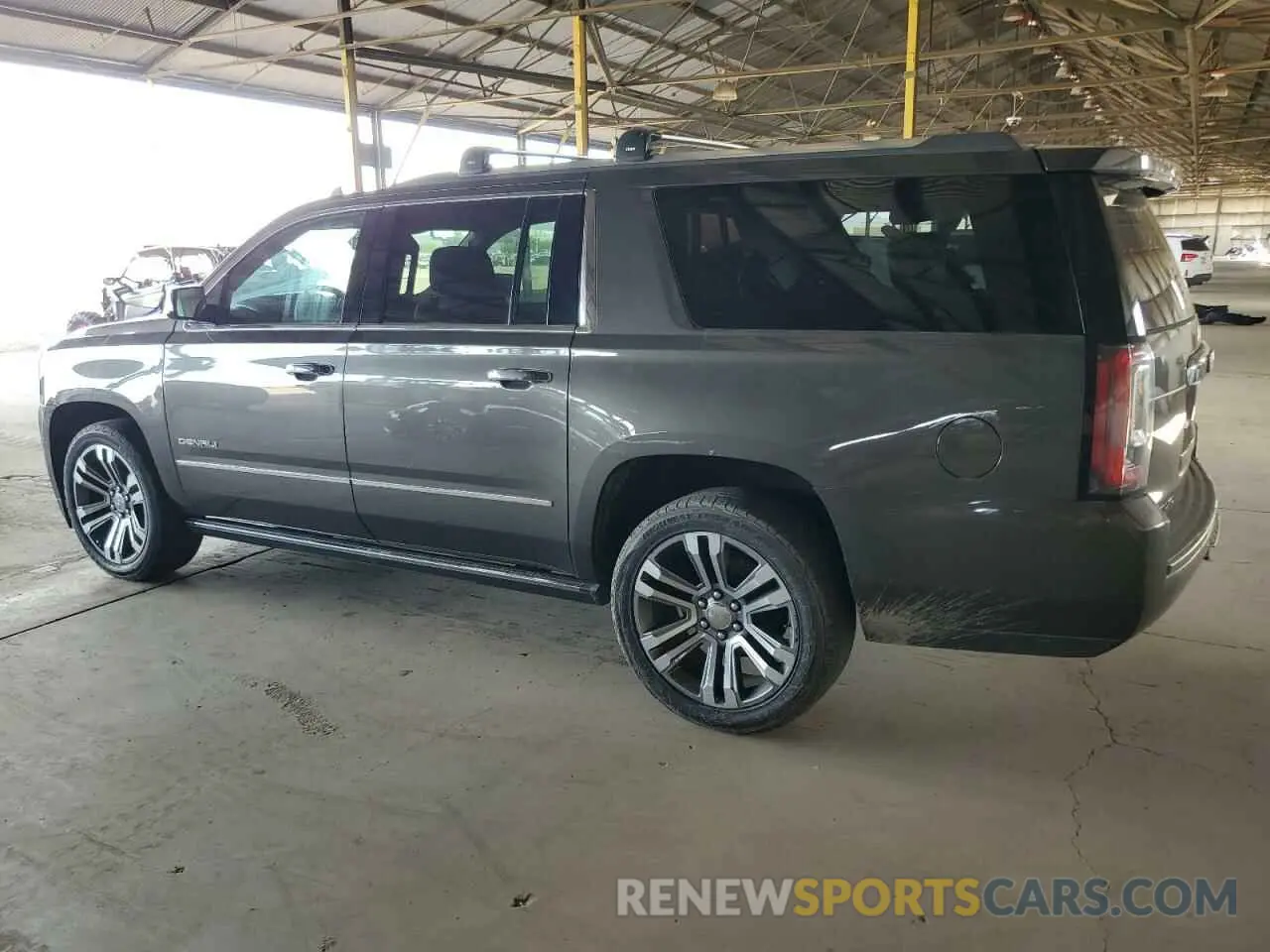 2 Photograph of a damaged car 1GKS2HKJ8KR205950 GMC YUKON 2019