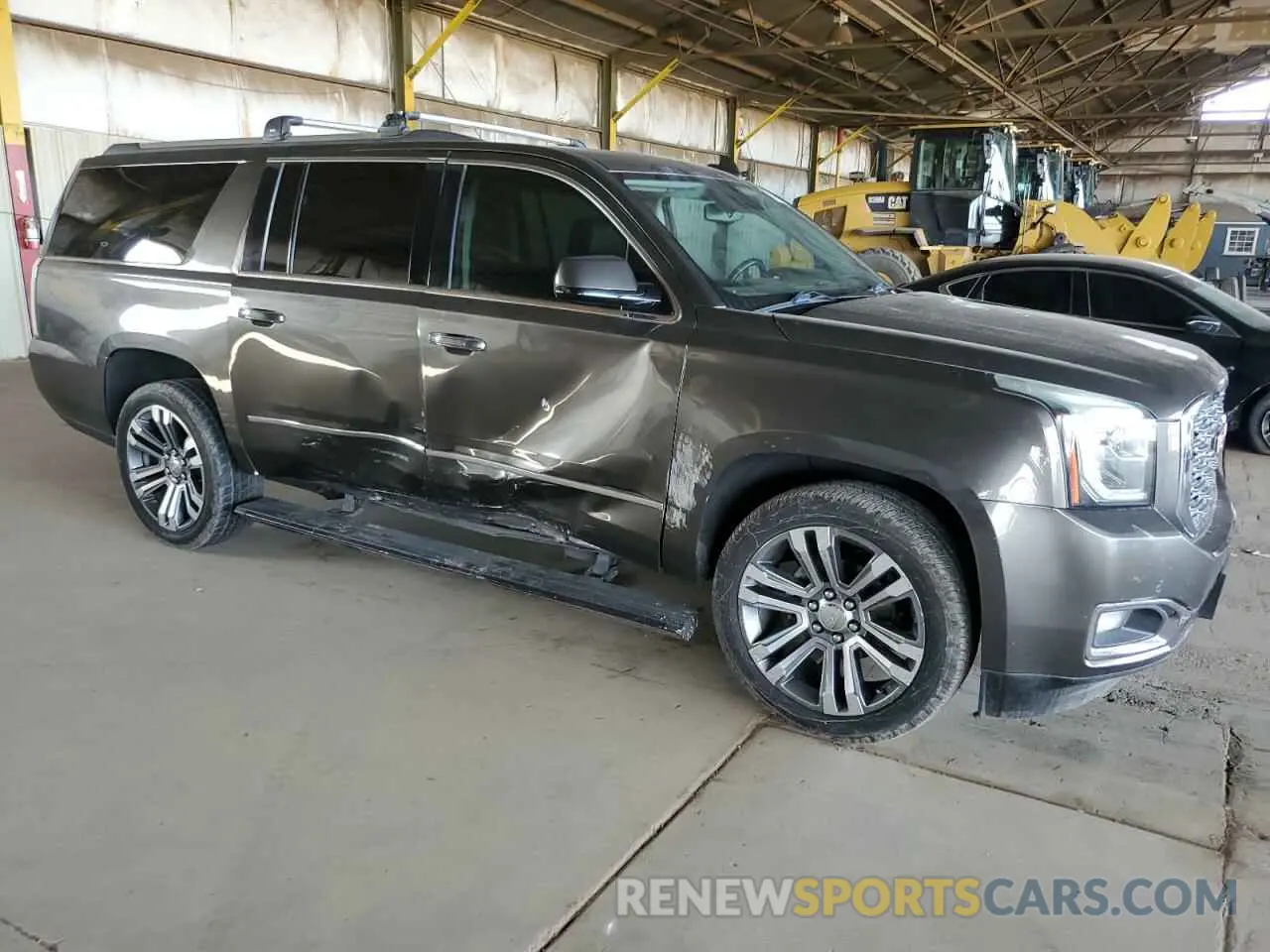4 Photograph of a damaged car 1GKS2HKJ8KR205950 GMC YUKON 2019