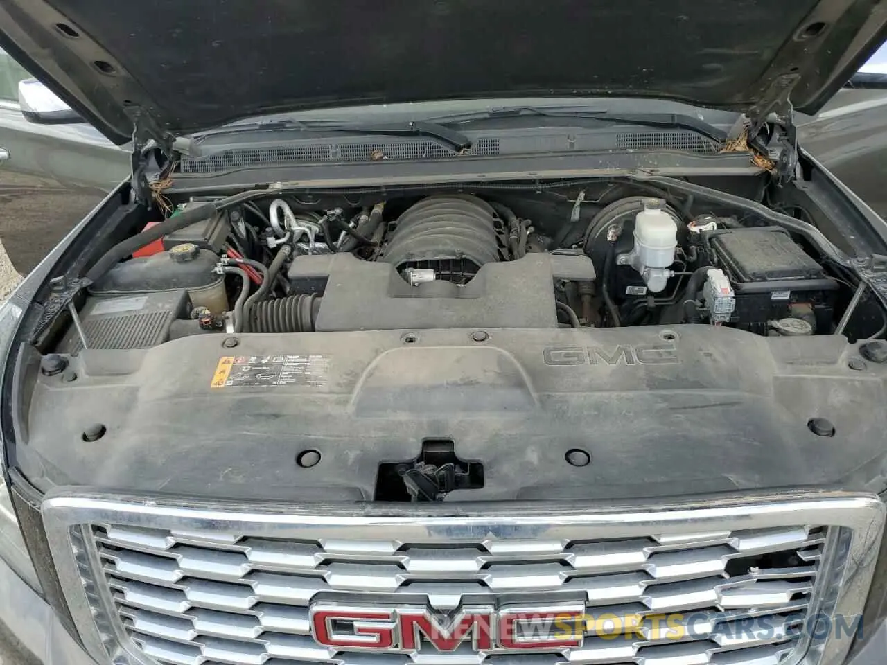 12 Photograph of a damaged car 1GKS2JKC3KR233809 GMC YUKON 2019