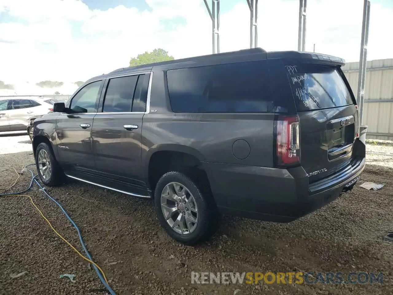 2 Photograph of a damaged car 1GKS2JKC3KR233809 GMC YUKON 2019