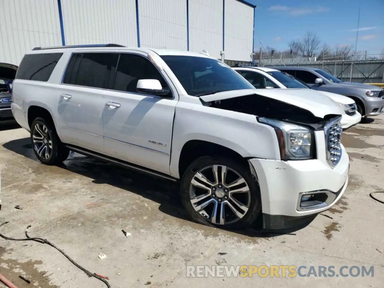 4 Photograph of a damaged car 1GKS1HKJ8LR101852 GMC YUKON 2020
