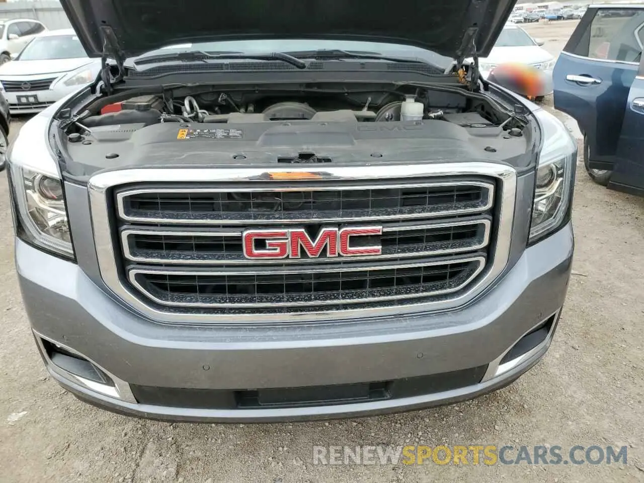 12 Photograph of a damaged car 1GKS2DKCXLR123892 GMC YUKON 2020