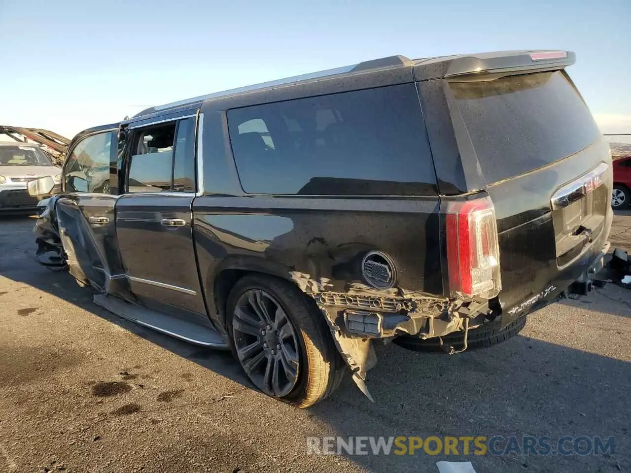 2 Photograph of a damaged car 1GKS2HKJ8LR203469 GMC YUKON 2020