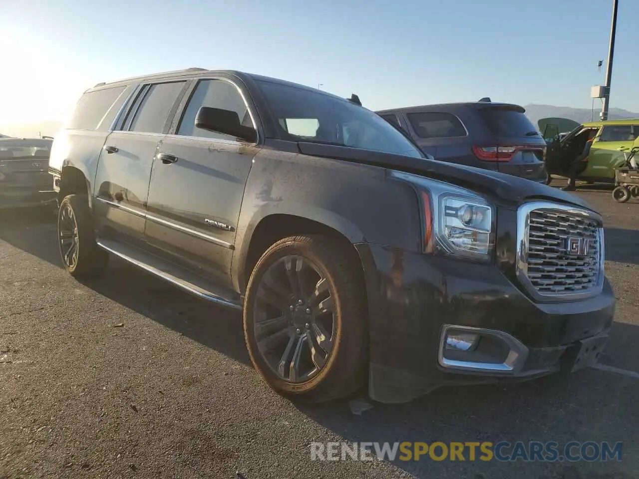 4 Photograph of a damaged car 1GKS2HKJ8LR203469 GMC YUKON 2020
