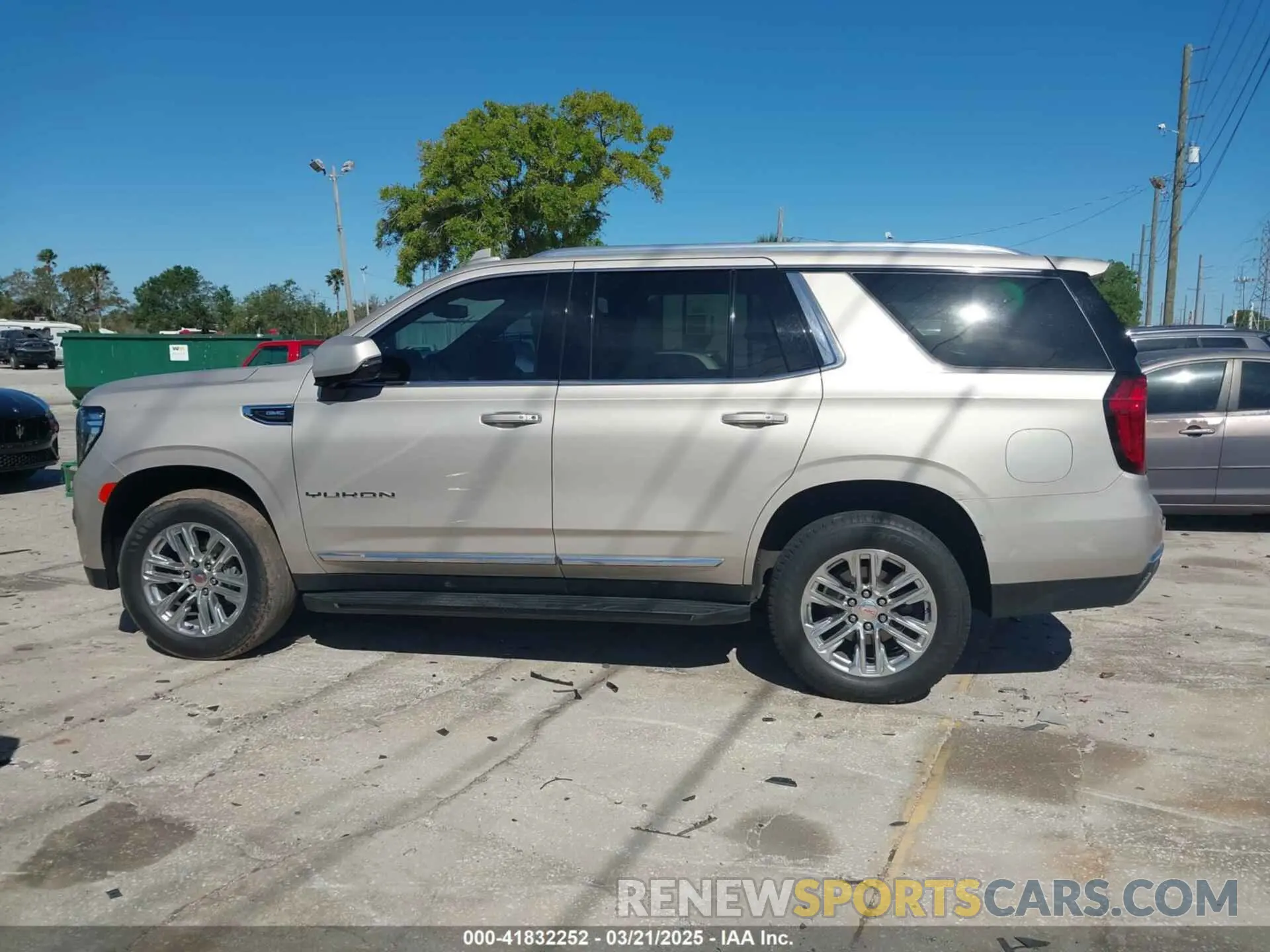 13 Photograph of a damaged car 1GKS1BKD3MR168352 GMC YUKON 2021