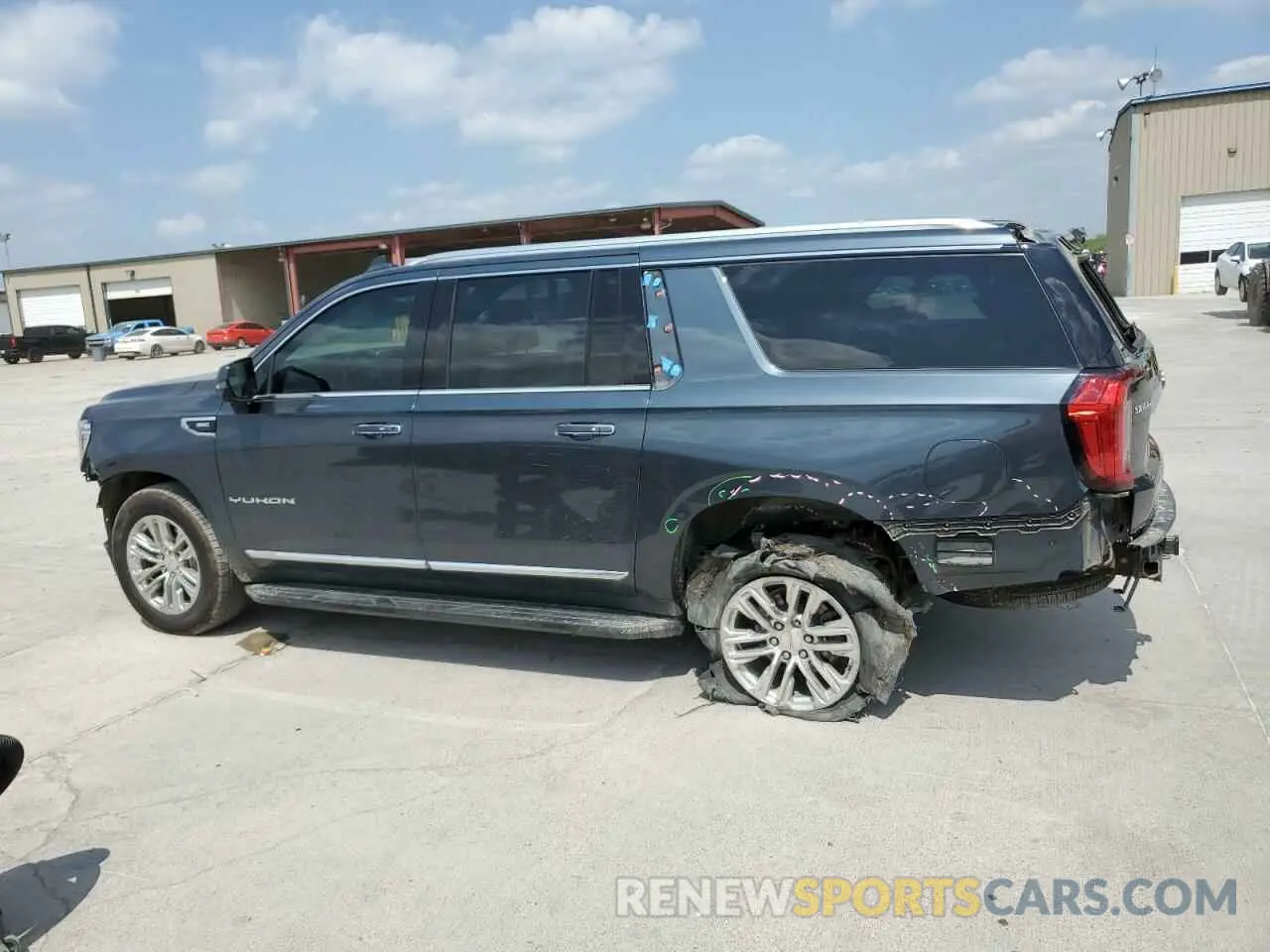 2 Photograph of a damaged car 1GKS1GKD7MR291908 GMC YUKON 2021