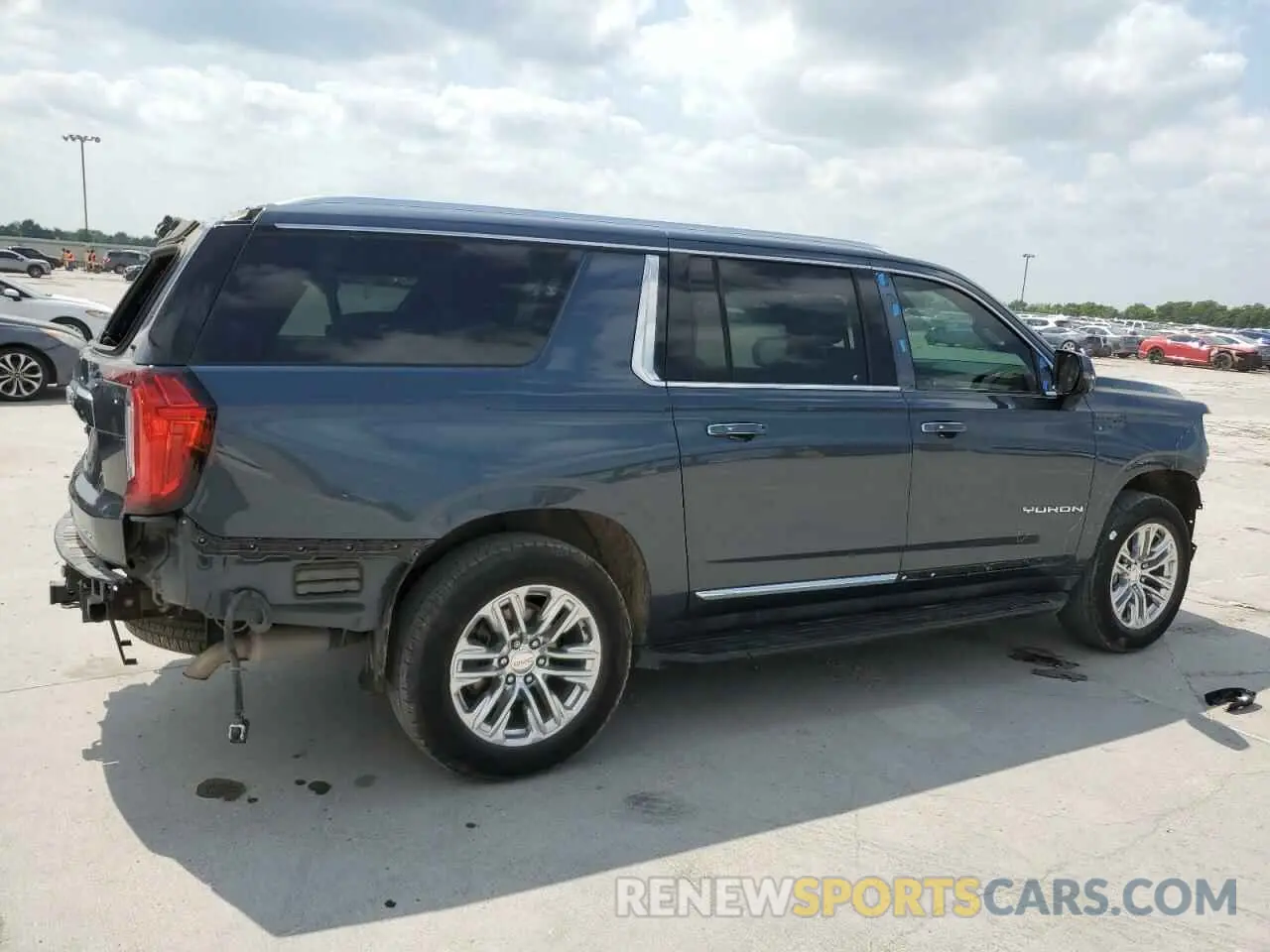 3 Photograph of a damaged car 1GKS1GKD7MR291908 GMC YUKON 2021