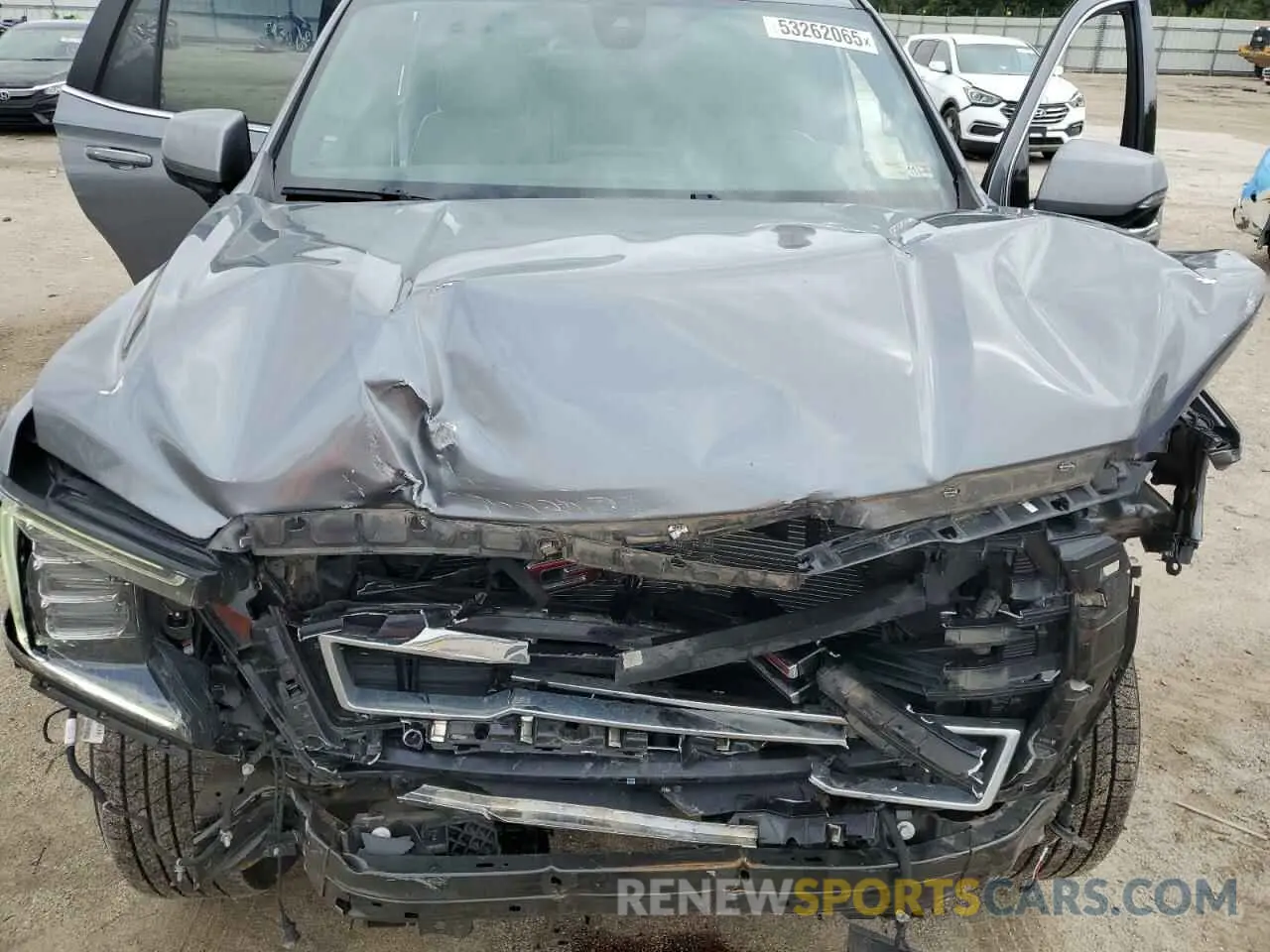 12 Photograph of a damaged car 1GKS2BKD7MR118891 GMC YUKON 2021