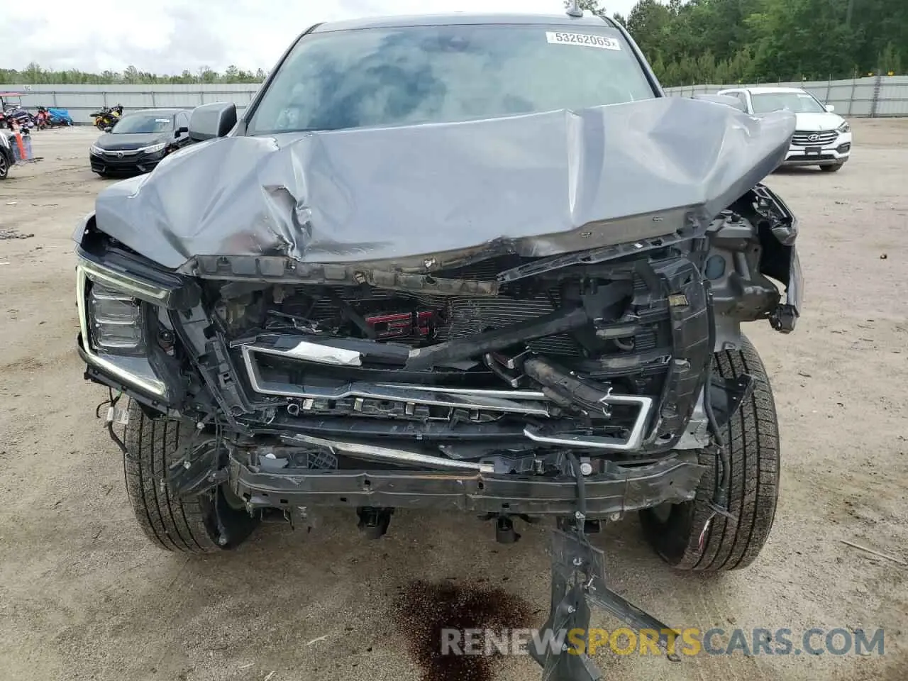 5 Photograph of a damaged car 1GKS2BKD7MR118891 GMC YUKON 2021