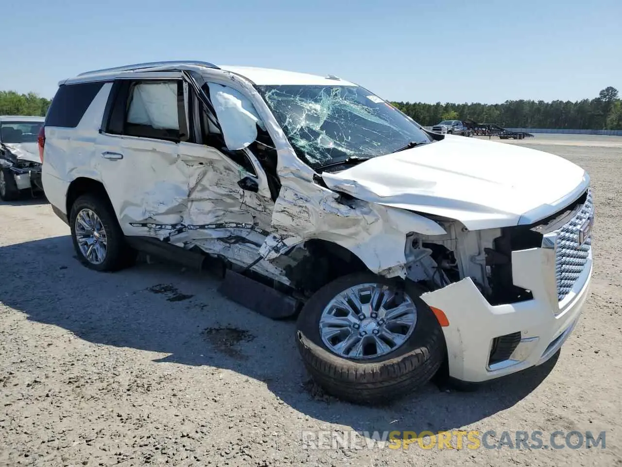 4 Photograph of a damaged car 1GKS2DKLXMR315704 GMC YUKON 2021