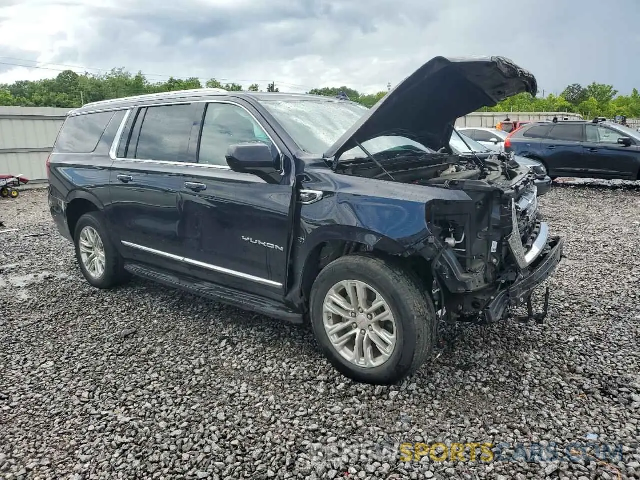 4 Photograph of a damaged car 1GKS2GKD0MR261758 GMC YUKON 2021