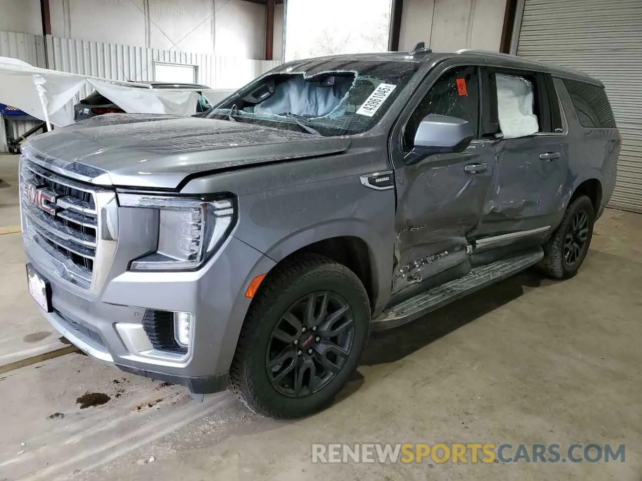 1 Photograph of a damaged car 1GKS2GKT1MR310067 GMC YUKON 2021