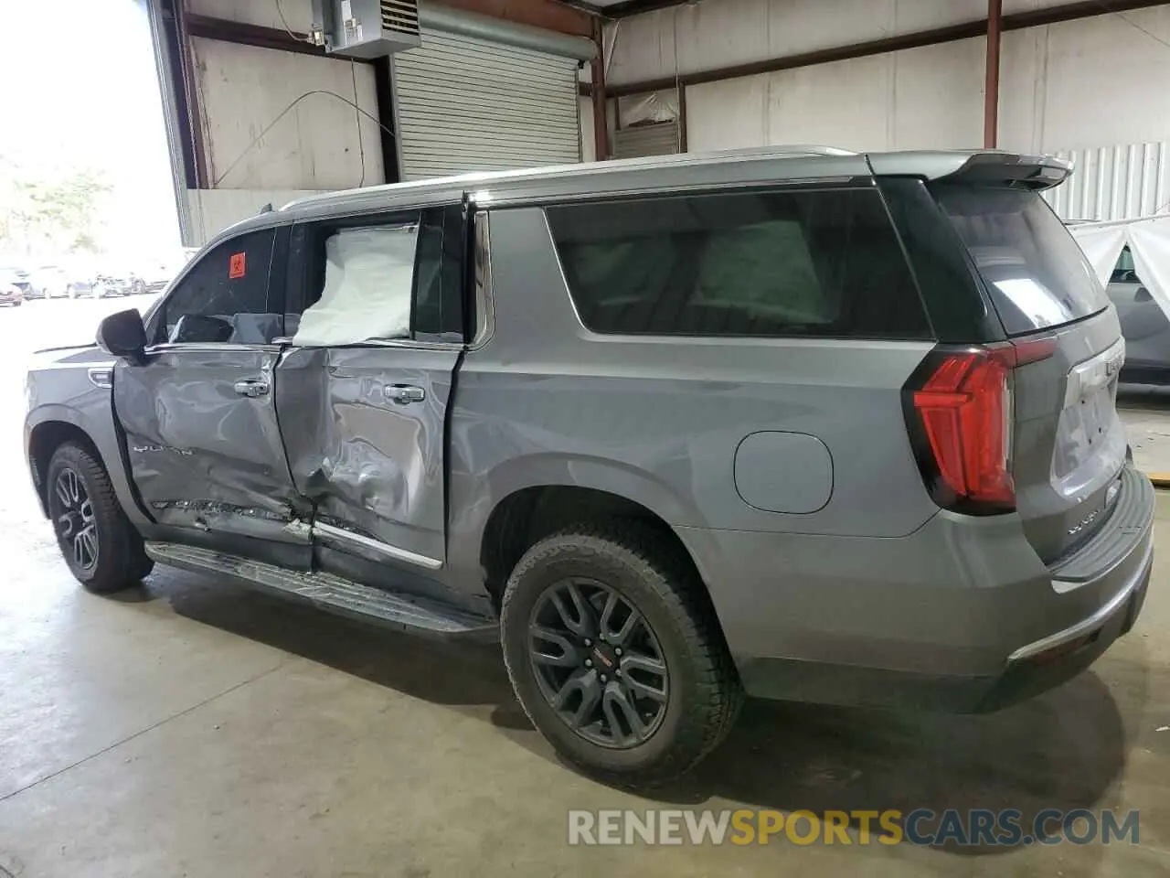 2 Photograph of a damaged car 1GKS2GKT1MR310067 GMC YUKON 2021